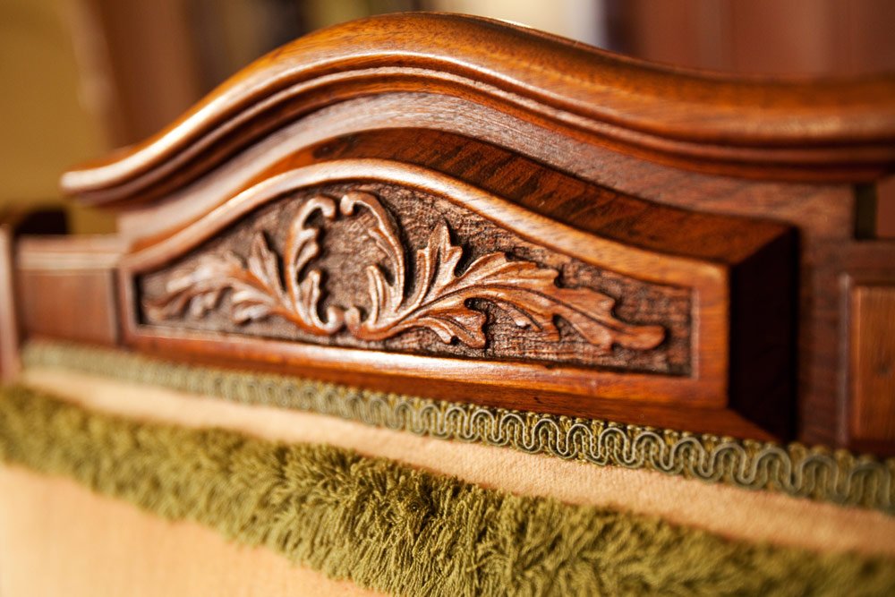 Photo by: Brad Nicol
A closer view of the armchair shows a carved top rail.