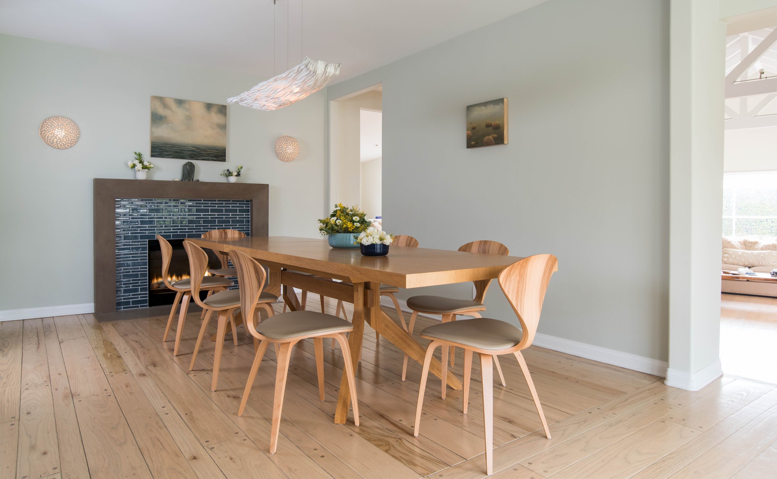 Photo by: Steven Dewall
A serene dining room designed to feel soft and light. Paintings by Louise Lebourgeois.