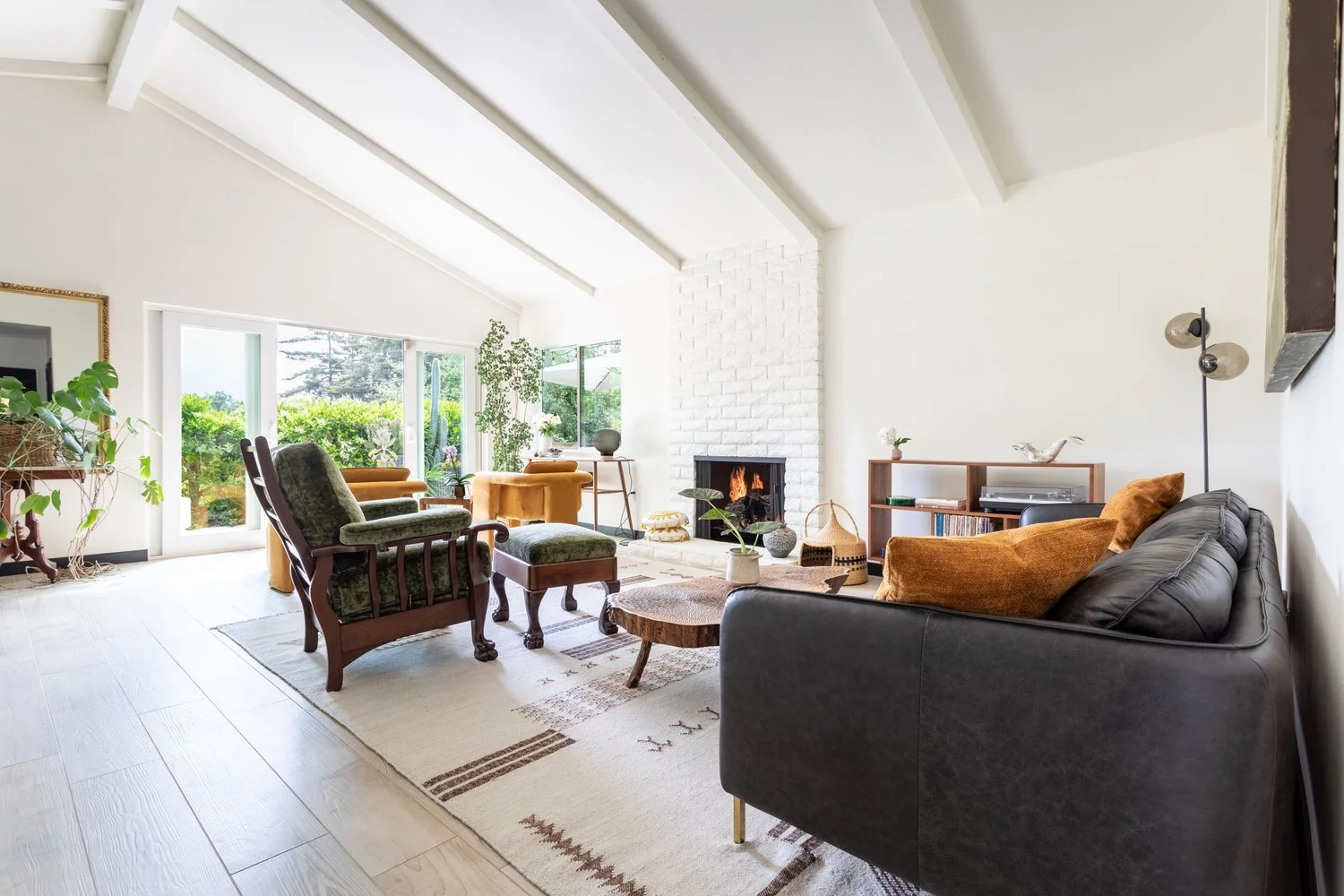 Photo by: Ace Misiunas
Integrating vintage and restored antique pieces within this home allowed the design team to incorporate sustainable practices in the design process while infusing spaces with pieces that held personal meaning through historical