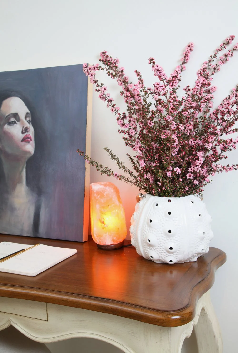 Photo by: Chas Metivier
A portrait painted by artist Brian Johnson sits atop a custom desk made in petite proportions.