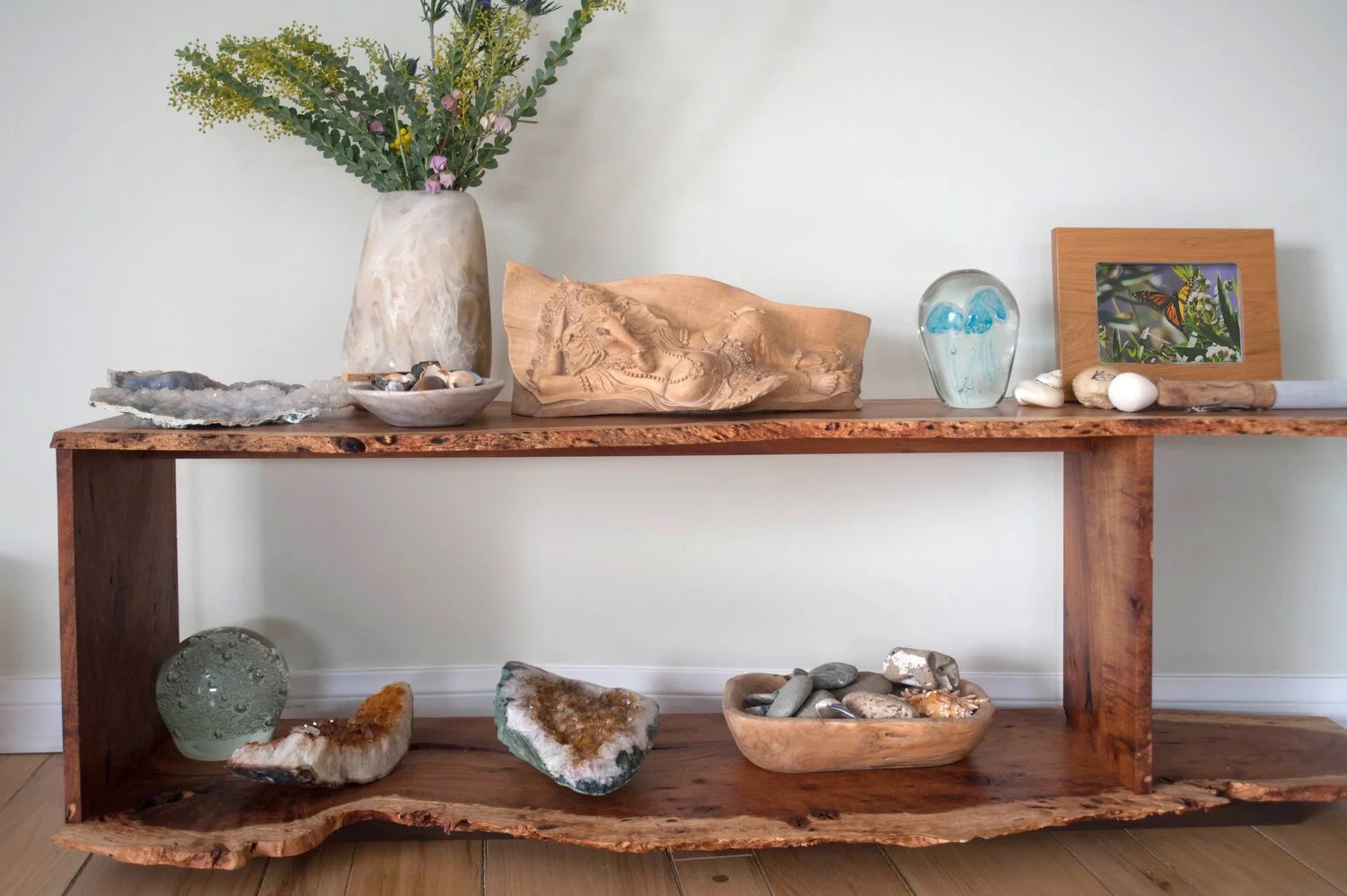 Photo by: Steven Dewall
Large mineral specimens are displayed among collected shells and personal treasures.
