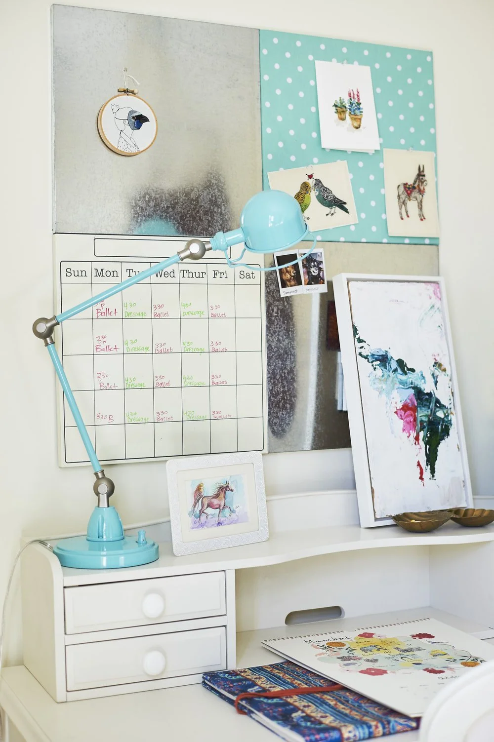 Photo by: Steven Dewall
An articulating desk lamp adds a pop of aqua  to the teen girl's study area.  
