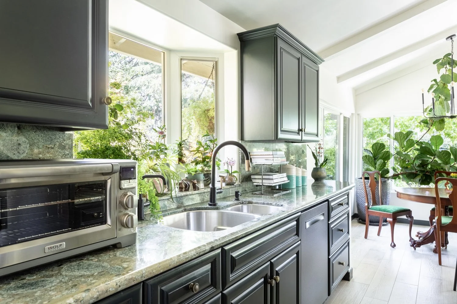 Photo by: Ace Misiunas
Luxury upgrades such as a touchless faucet and an instant hot water dispenser create a sense of comfort and ease that encourage convenience and joy in the simple pleasures of cooking a meal or enjoying an instant cup of tea.