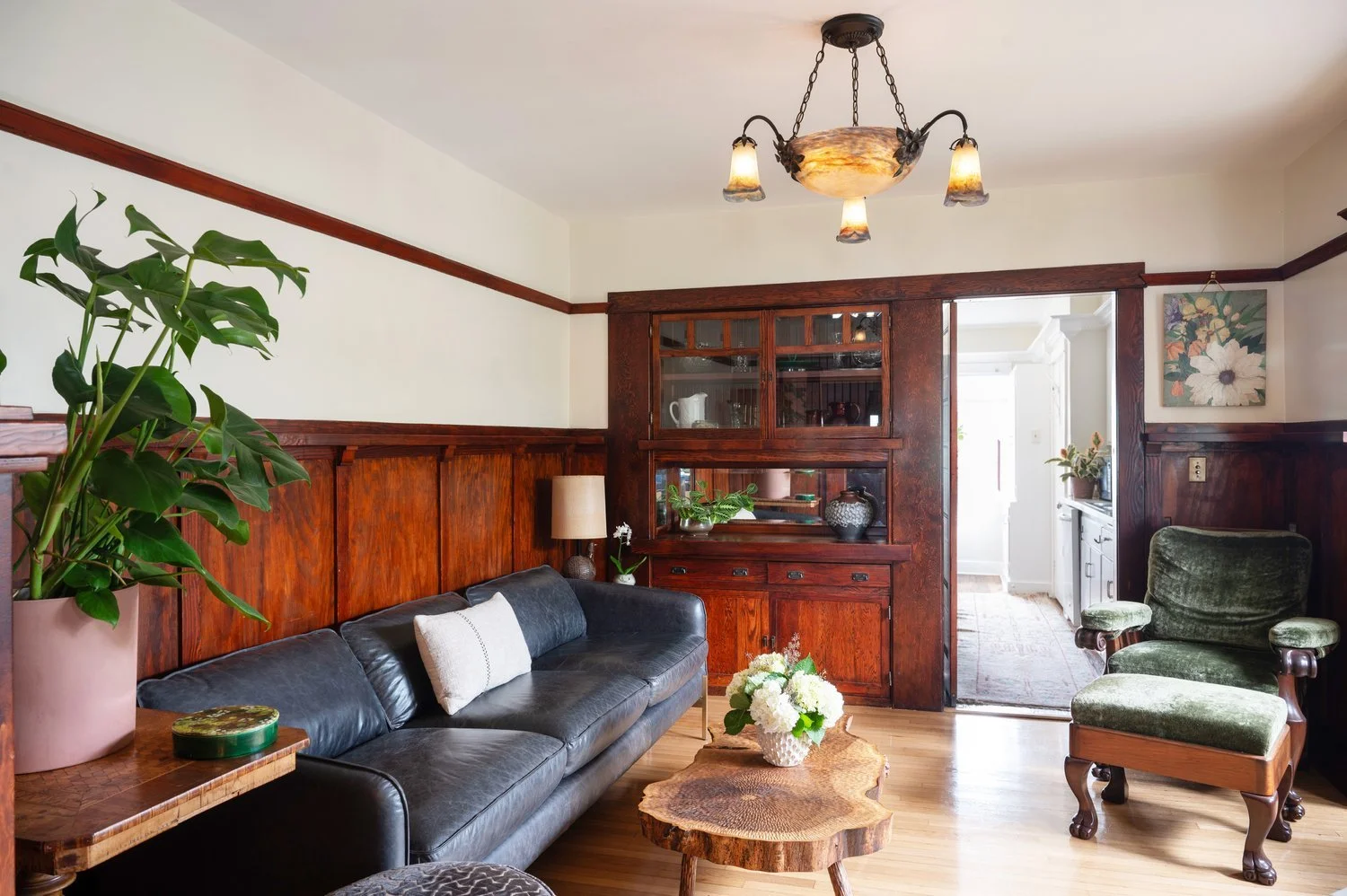 Photo by: Steven Dewall
The living room combines vintage, antique, and contemporary objects to create a space that connects sustainable design practices, expert craftsmanship, and biophilic design.