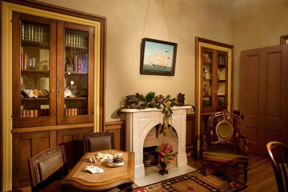 Photo by: Brad Nicol
An original marble mantlepiece and authentic Victorian antiques adorn this study.