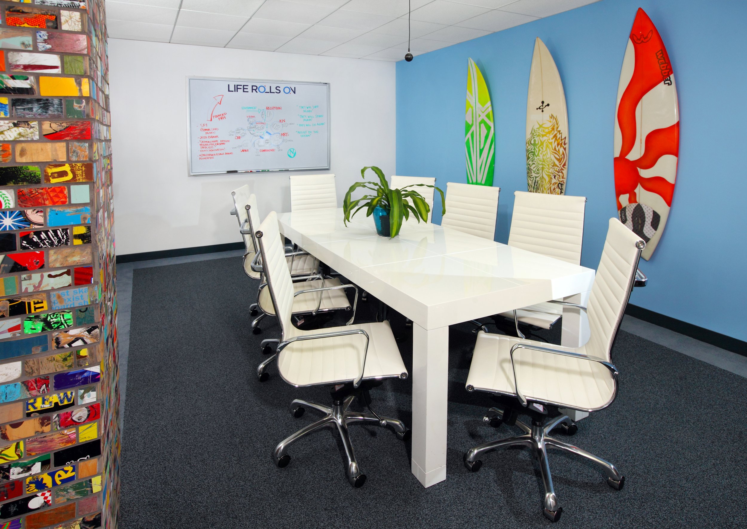 Photo by: Chas Metivier
Repurposing the building's existing carpeting keeps the project budget in check and prevents material from ending up in a landfill.