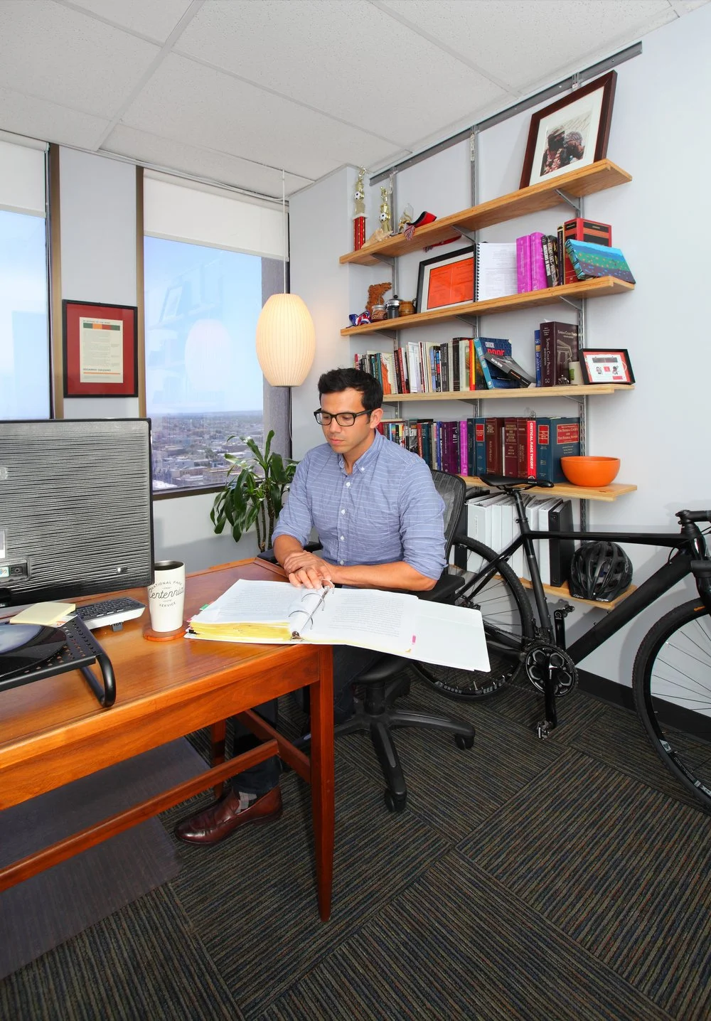 Photo by: Chas Metivier
Nicolas Espiritu at work in his office.