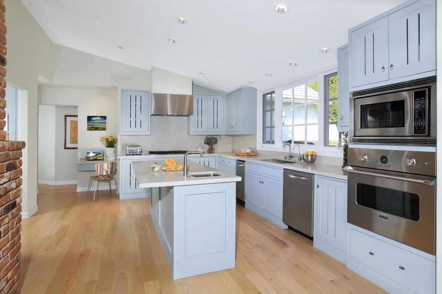 Photo by: Chas Metivier
Traditional styling and contemporary details are a great kitchen combination for a modern family. The LED recessed lighting is attractive and energy efficient.