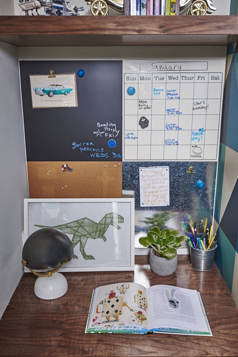 Photo by: Steven Dewall
Each boy's desk includes a utility wall with a chalkboard, pin board, metal panel for magnets and wipe off board calendar. 