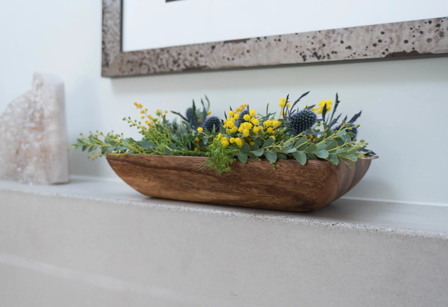 Photo by: Steven Dewall
The custom concrete fireplace has a softened finish and brushed edges.