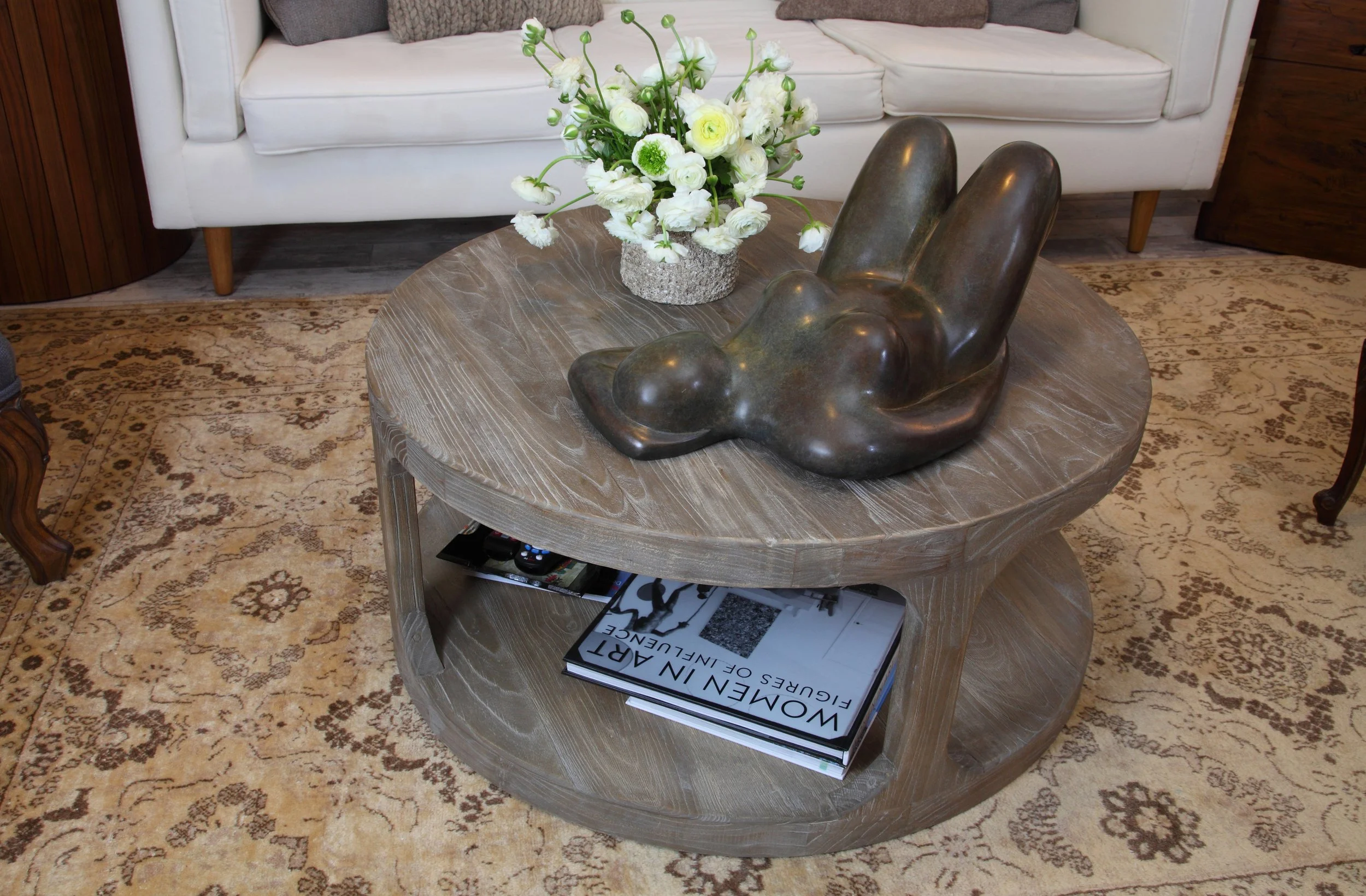 Photo by: Chas Metivier
A solid bronze sculpture perched on a coffee table specially selected to support its massive weight.