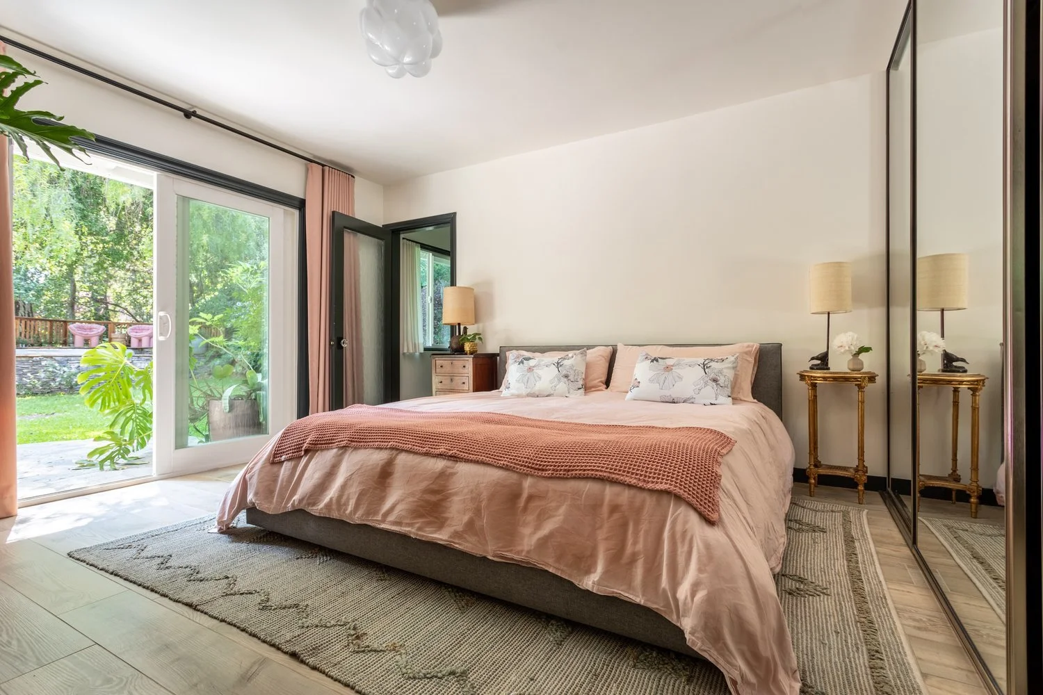 Photo by: Ace Misiunas
Custom pillow shams made from the Kale Tree Matilija Poppy Textile in Natural create a harmonious blend between the pink bed linens and Gardenia painted walls while incorporating the beauty of CA native wildflowers into the spa