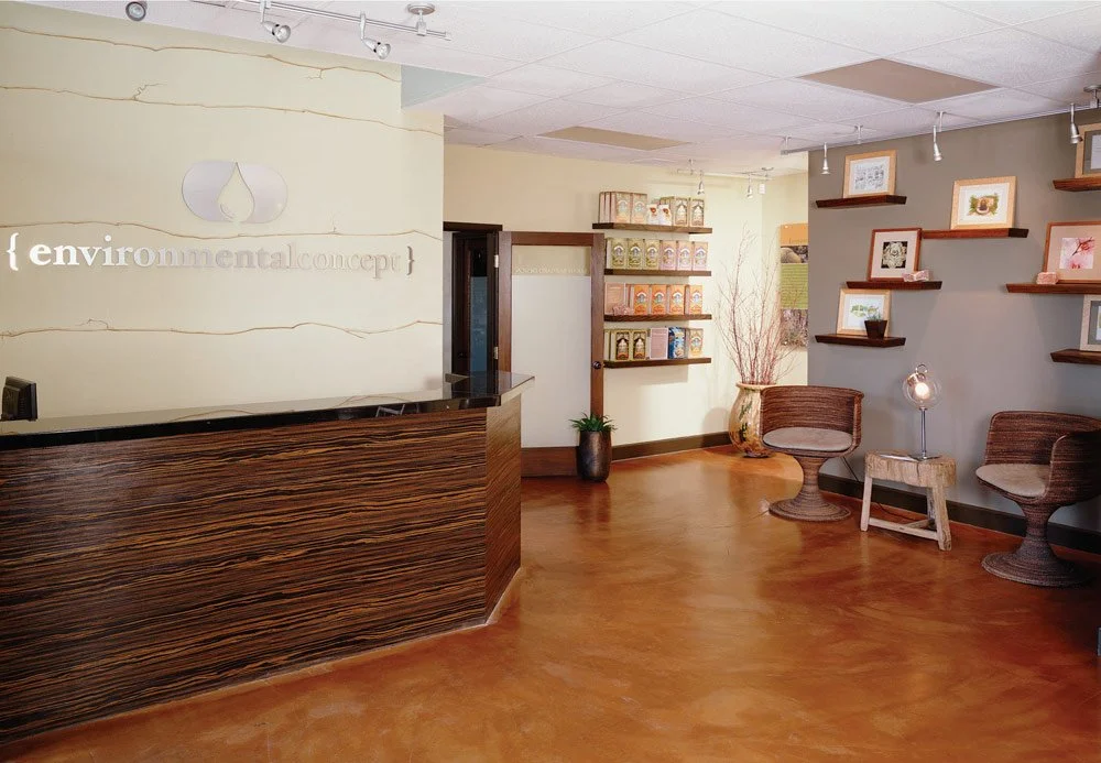 Photo by: Charlie Daniels
The salon incorporates rehabilitated and salvaged materials as showcased with the reception desk, and this reuse minimally impacts the environment.  The polished concrete floors and painted branch mural embody the contempora