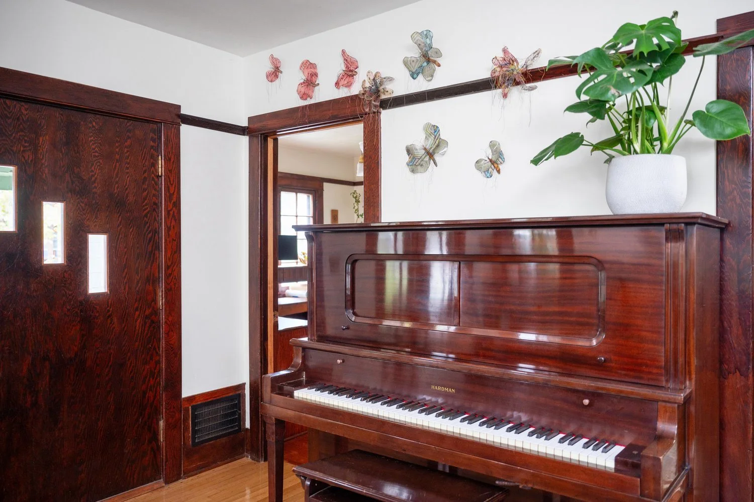 Photo by: Steven Dewall
This 1912 Hardman player piano is a unique addition to the dining room. Meticulously restored, it fills the home with beautiful music.