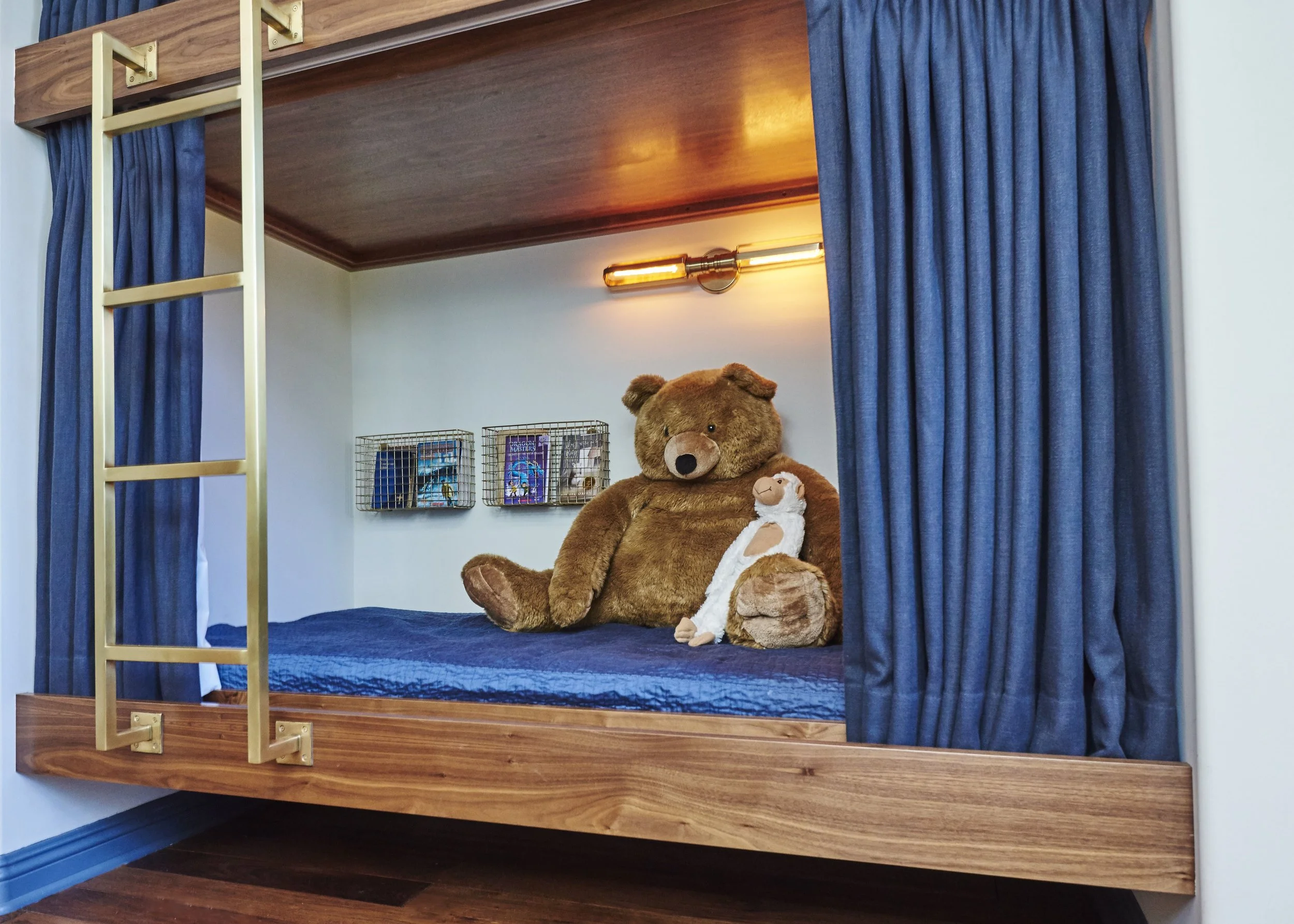 Photo by: Steven Dewall
Newly built walls allow for custom-made American walnut bunk beds that provide each boy with his own private cave.
