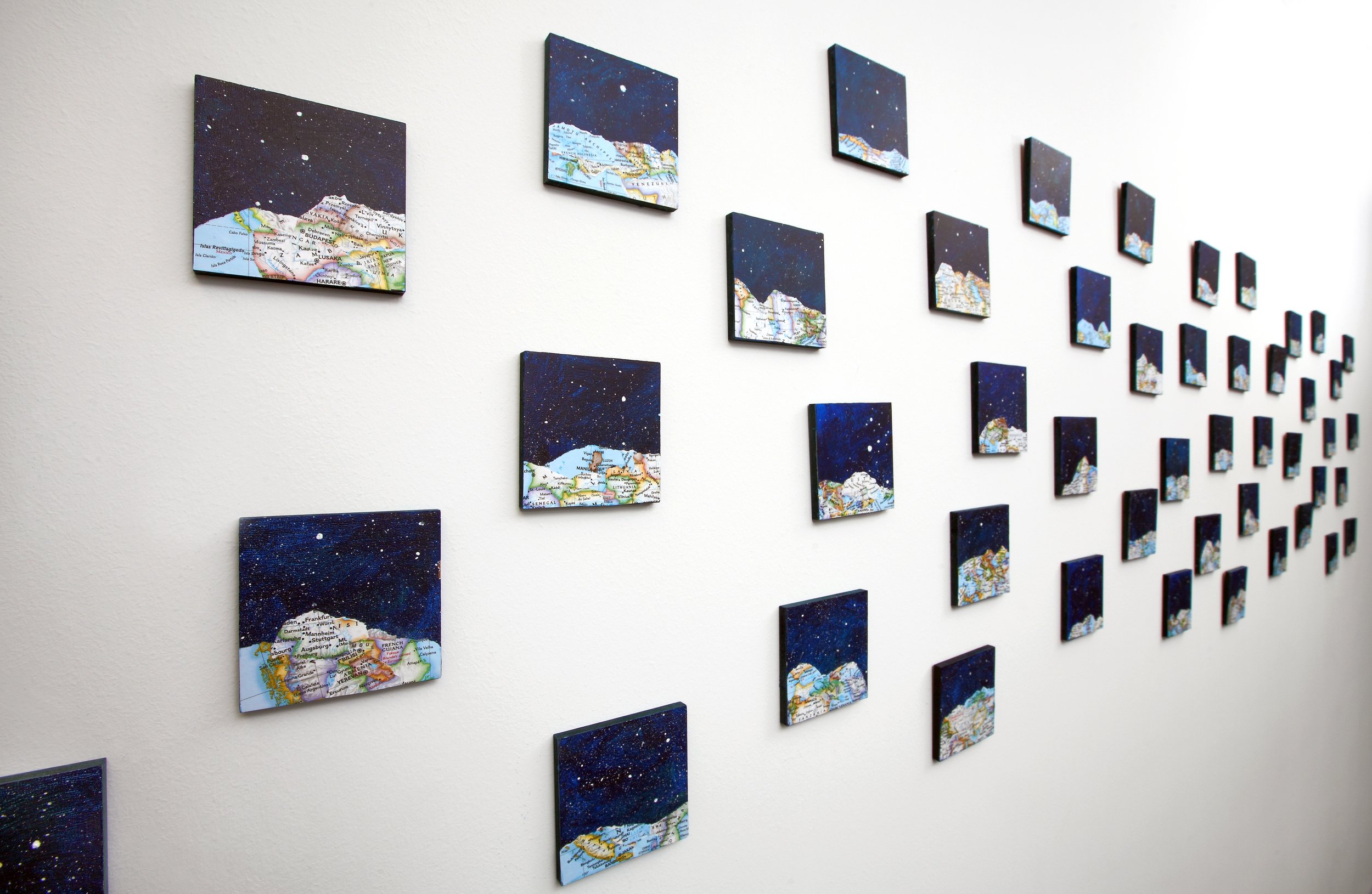 Photo by: Chas Metivier
An office wall features a mixed-media on panels arrangement entitled As Many Dreams As There Are Stars In The Sky by artist Nicole Steir.