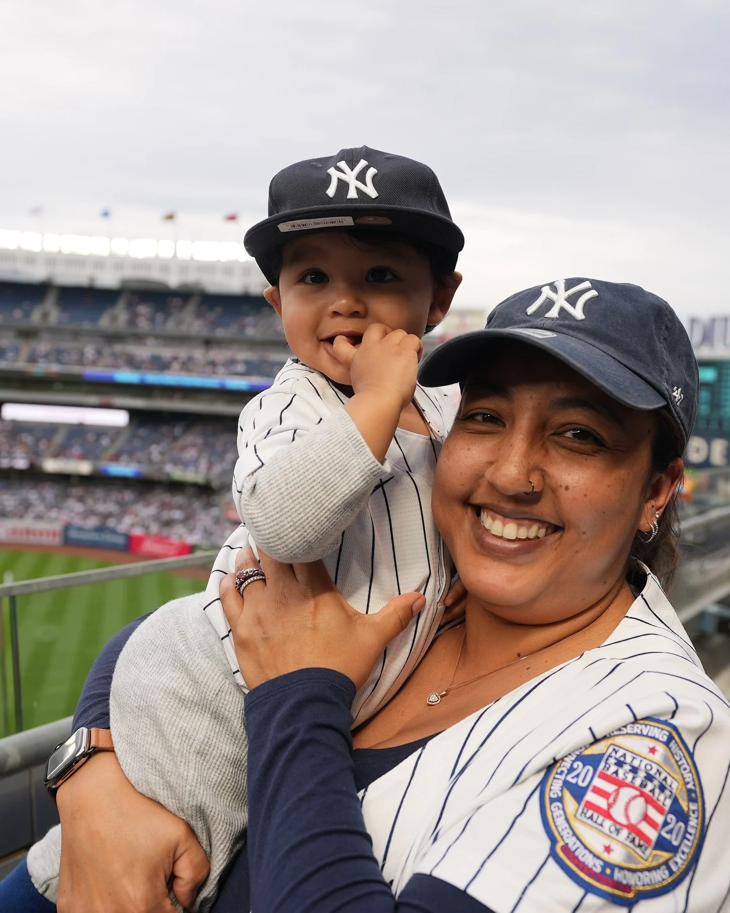 Yankee Stadium&rsquo;s tiniest fan, soaking in the cheers with Mom! ⚾️🤍
.
@yankees 
.
#photographer #newyorkcity #yankees #astros #bronx