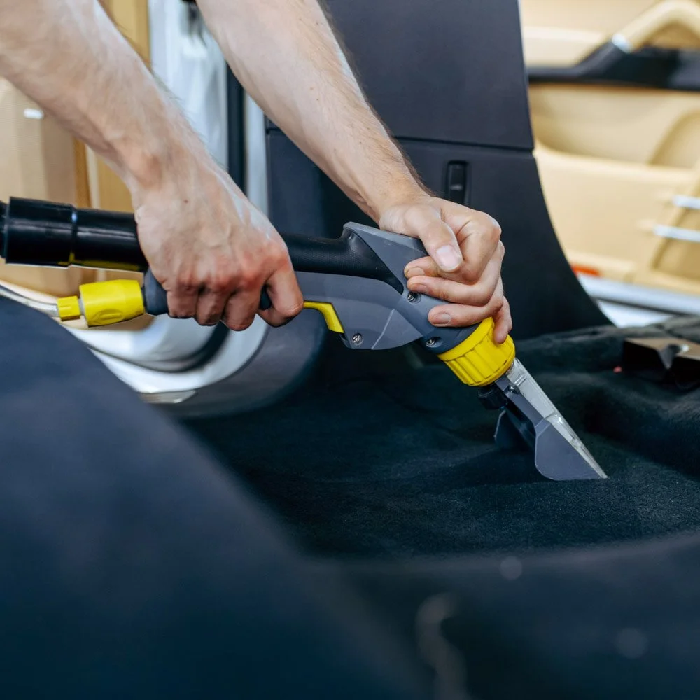 Interior vacuuming station at Jurassic Car Wash on Marbach Road in San Antonio.
