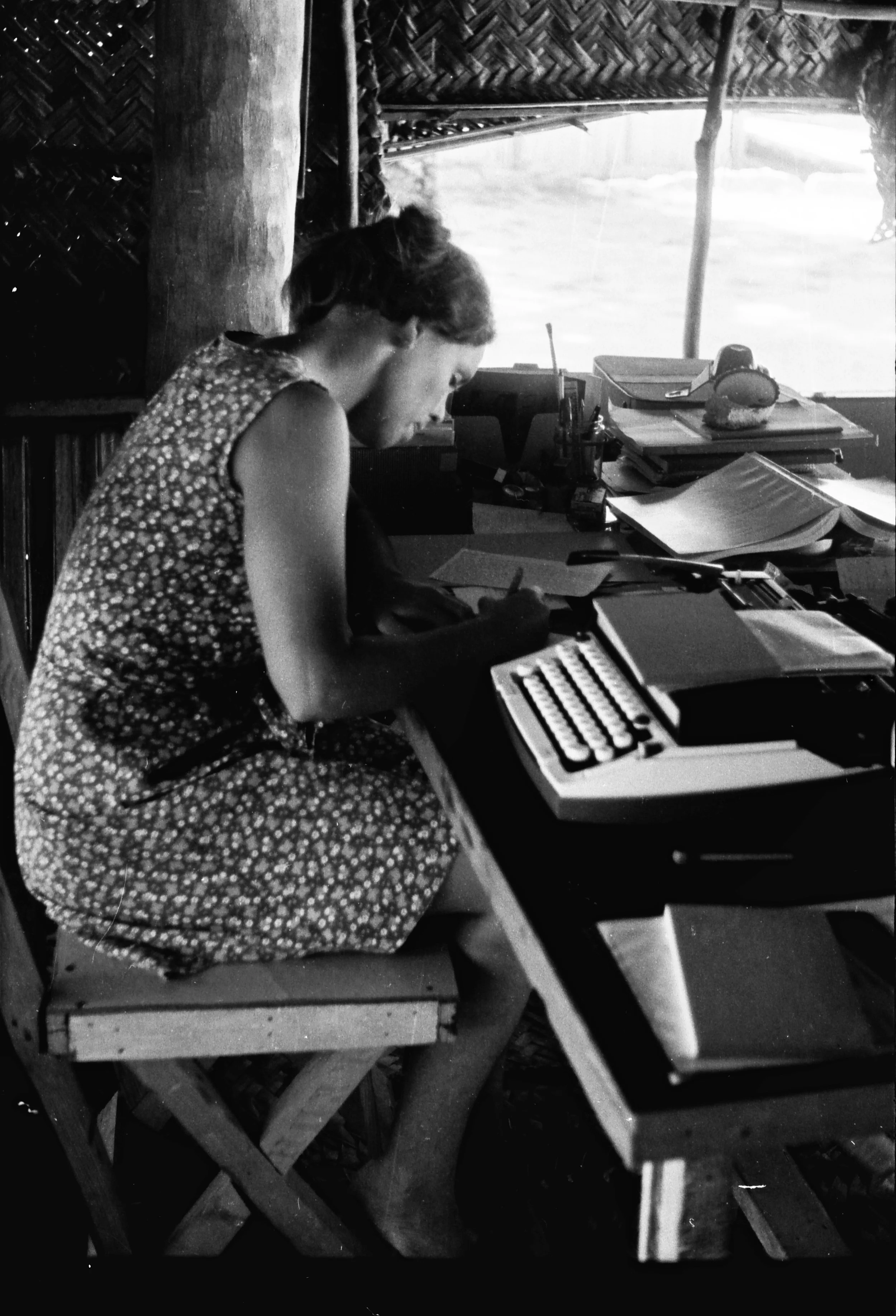 Anne writes field notes in our house