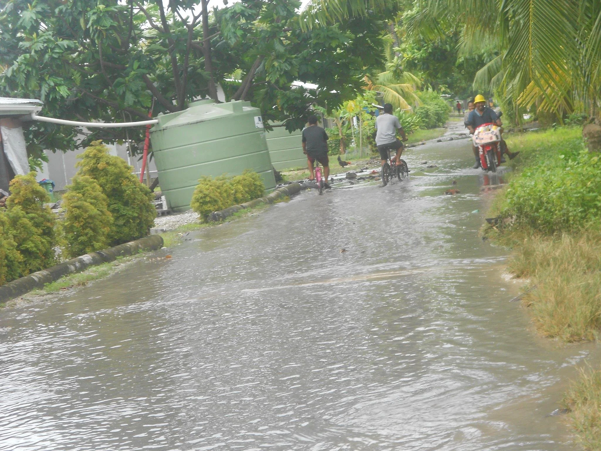 Flooded street in village