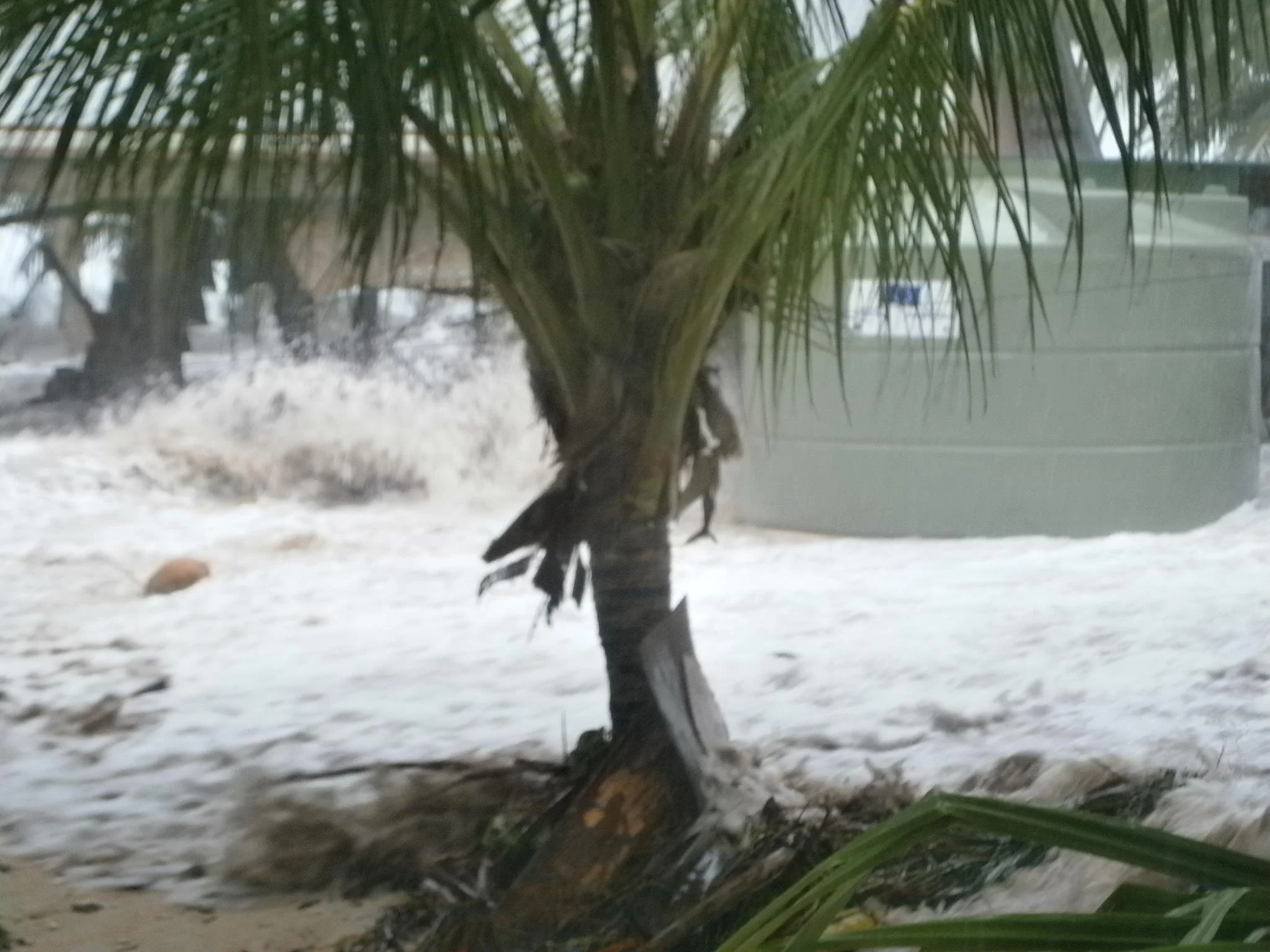 House and water tank being hit by surge
