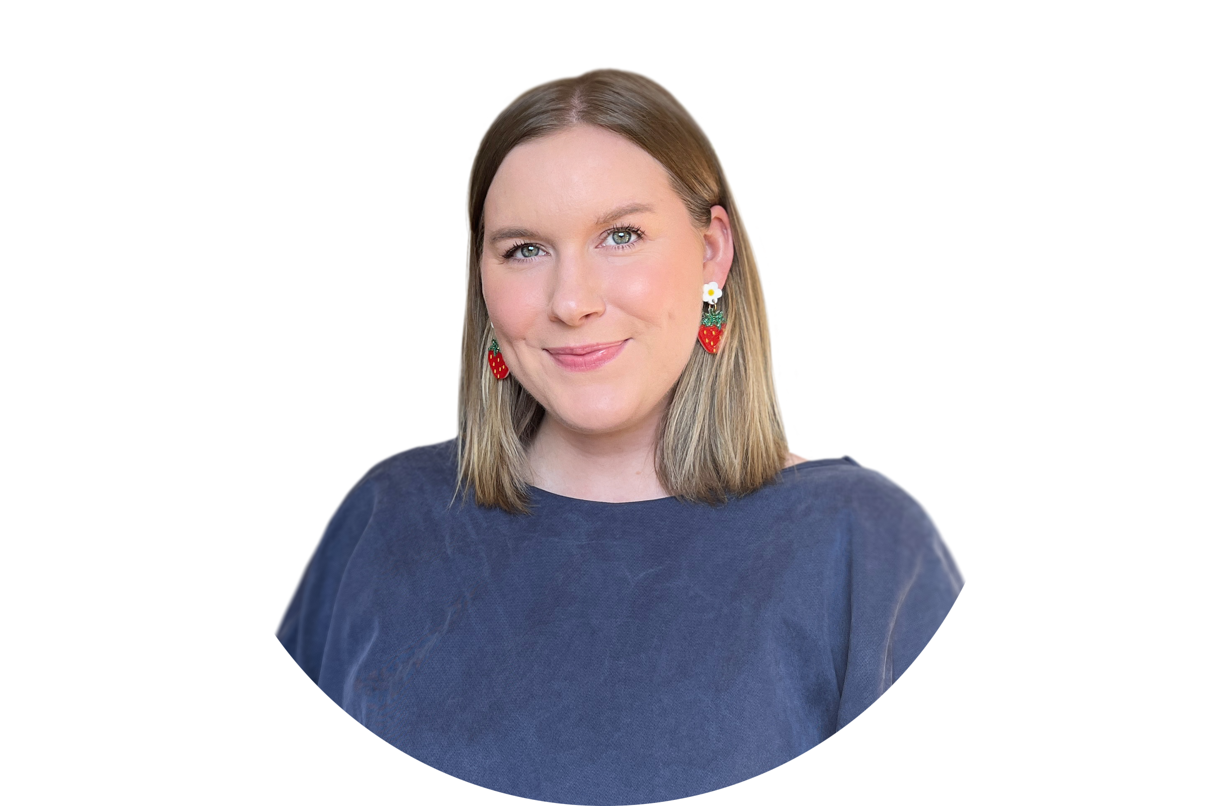 Freelance wedding and event copywriter Heather Leith's headshot, where she has shoulder-length blonde hair and is wearing a navy blue shirt and strawberry-shaped earrings, smiling against a white background.