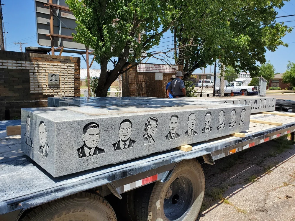 The monument’s granite slabs loaded on a flatbed for transport.
