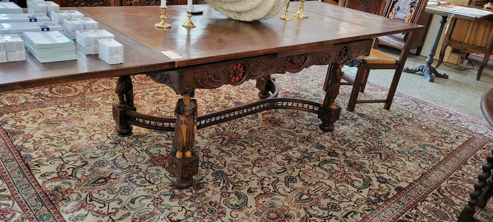 French Breton Style Draw Leaf Table & 6 Chairs with Hand Carved Scenes