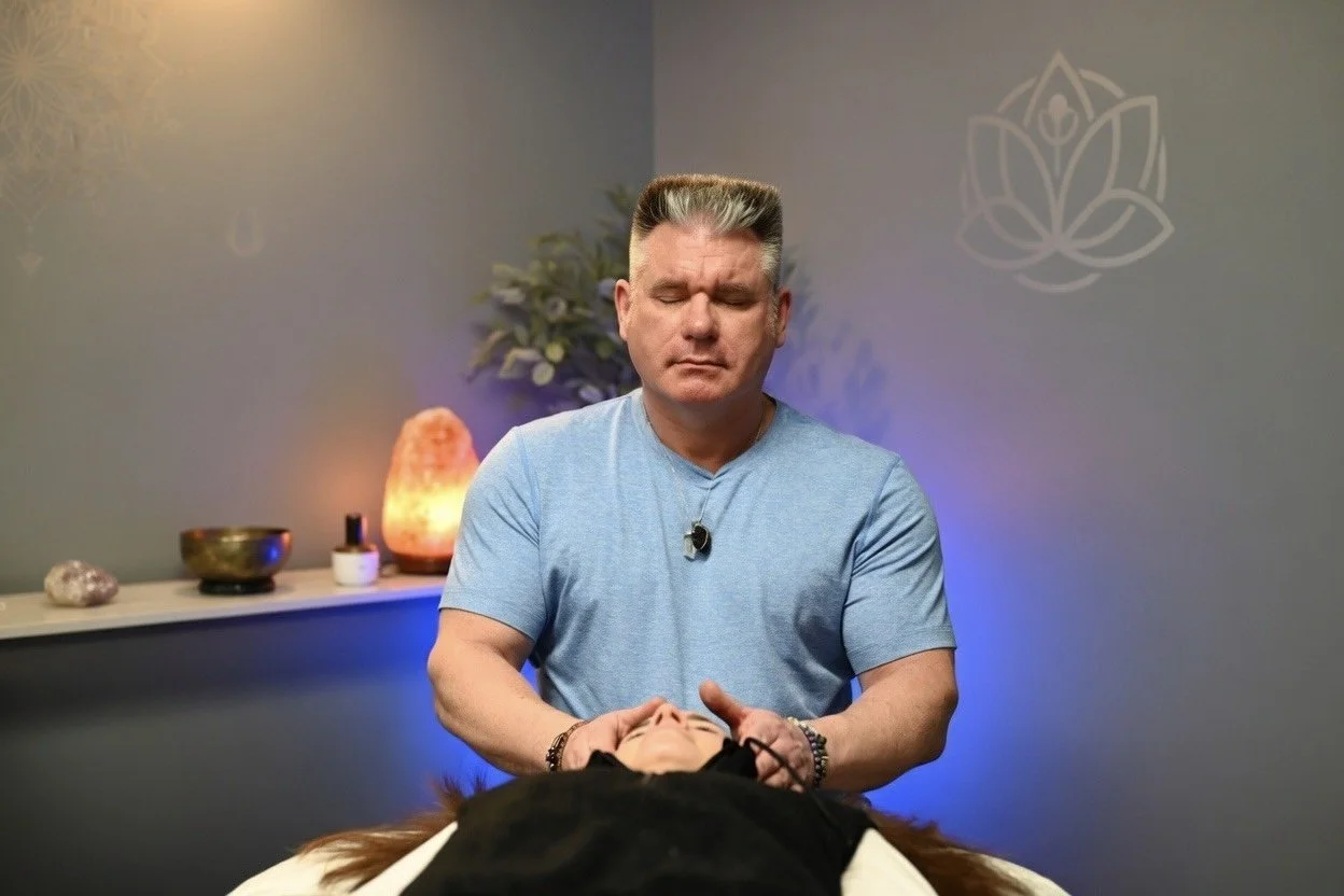 David Lingley performing a Reiki energy-healing session