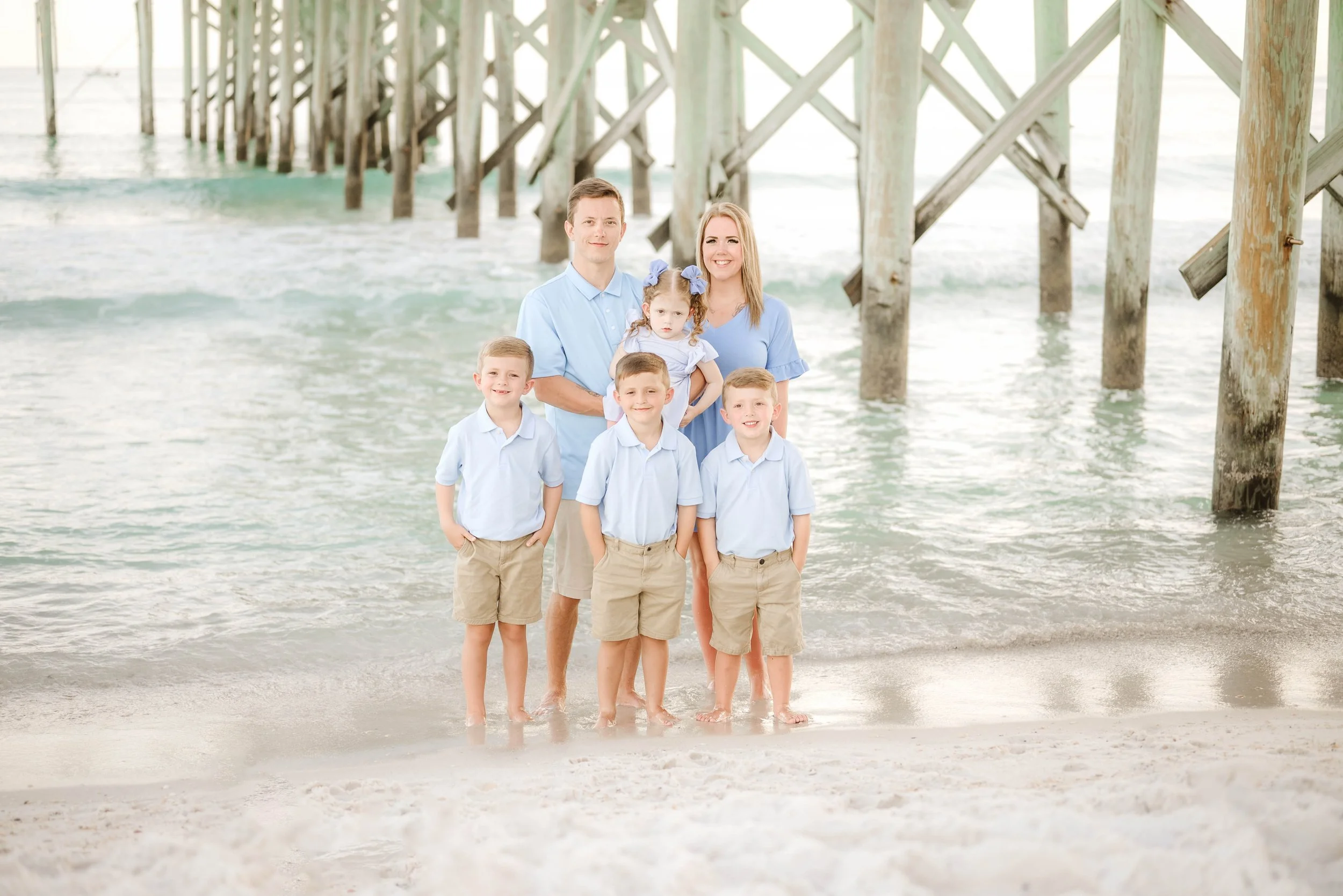family at st andrews state park beach doing a photoshoot