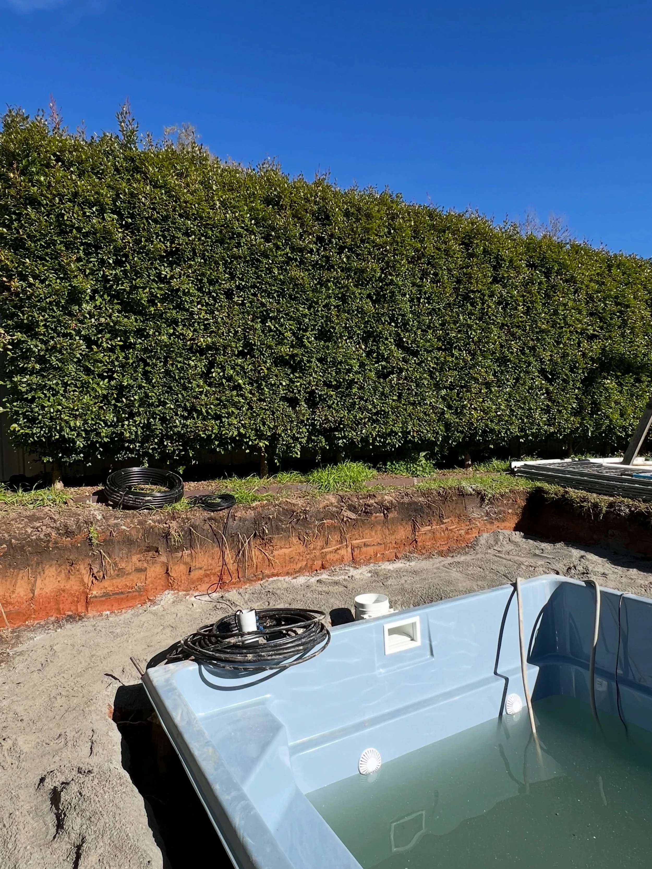 Work in progress | Side Cut 🪏

Sloping block? Not a problem for the Summer Central team! Side cuts are a key part of building a pool and getting it perfectly level on sloping ground.

Every block is unique so we&rsquo;ll always make sure to take the