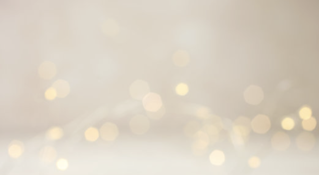 Blurred background with soft, out-of-focus light bokeh effets.