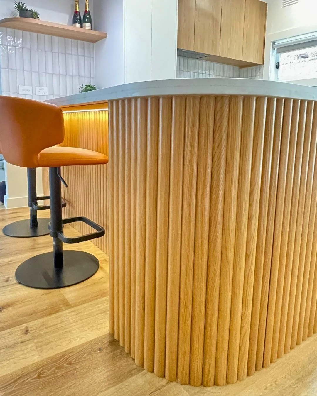 After: luxury Essendon kitchen with marble benchtop and modern appliances