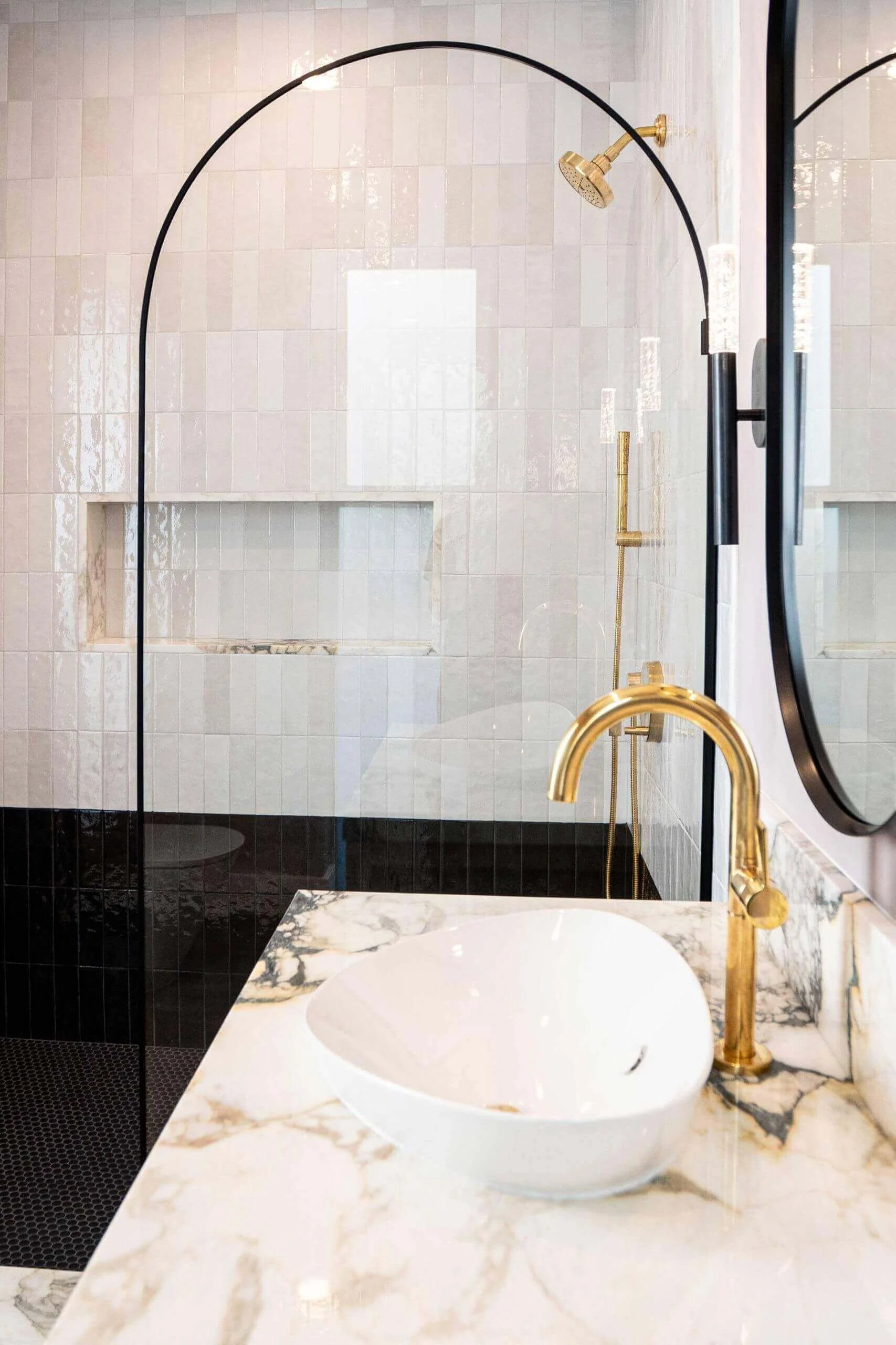 Brushed brass shower and premium vertical tiling Toorak bathroom remodel