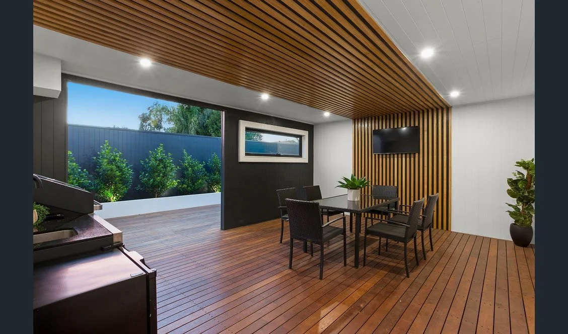 South Yarra home extension with timber‑screen patio and built‑in BBQ
