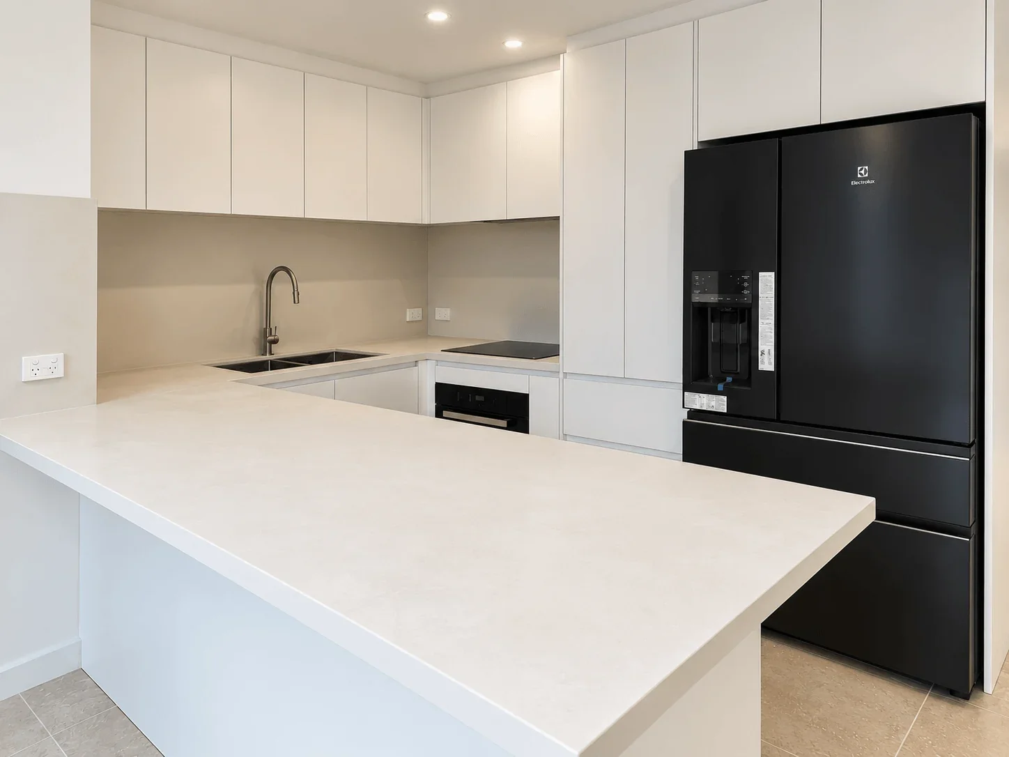 South Yarra kitchen renovation with Dekton peninsula benchtop and integrated storage