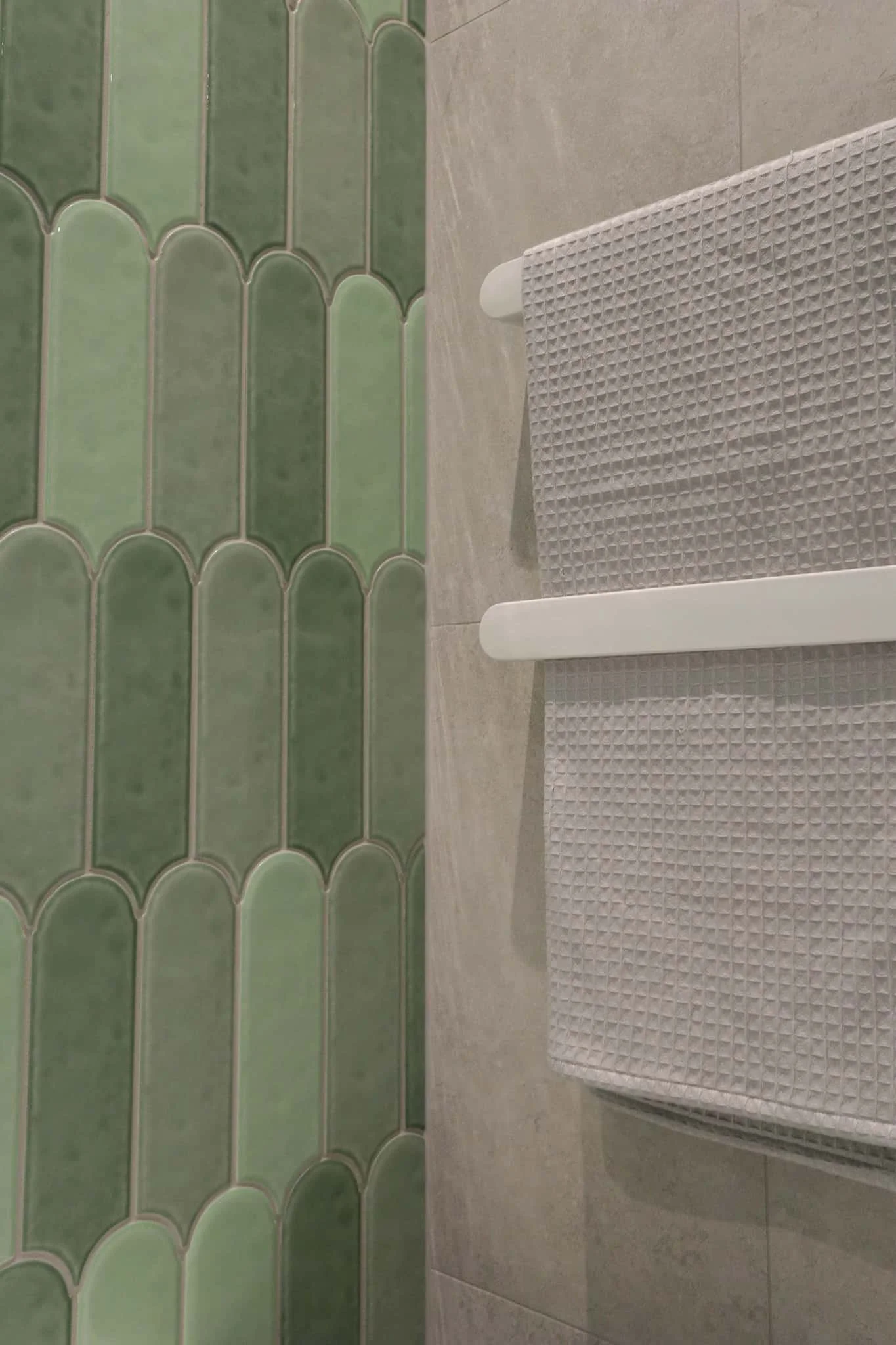 Contemporary Strathmore bathroom renovation featuring dual green basins and matte white wall mixers