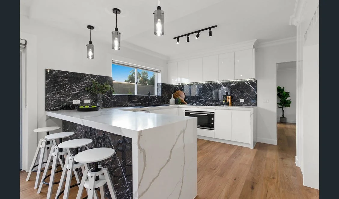 Keilor East full‑home renovation featuring open‑plan living, new kitchen and bathrooms