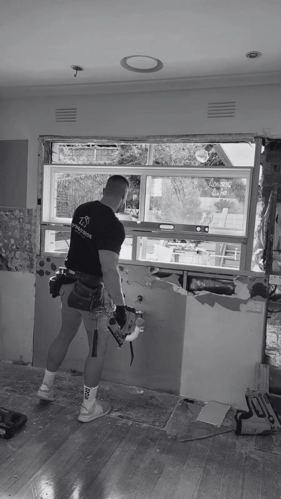 Essendon functional laundry with pull-out hampers Melbourne