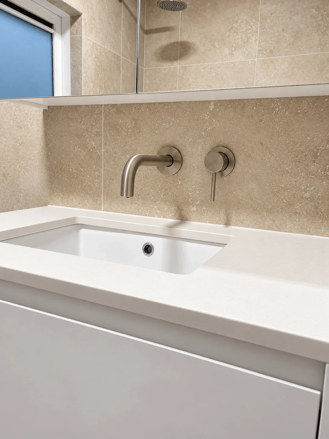 South Yarra bathroom renovation with wall-mounted tapware and stone-top vanity