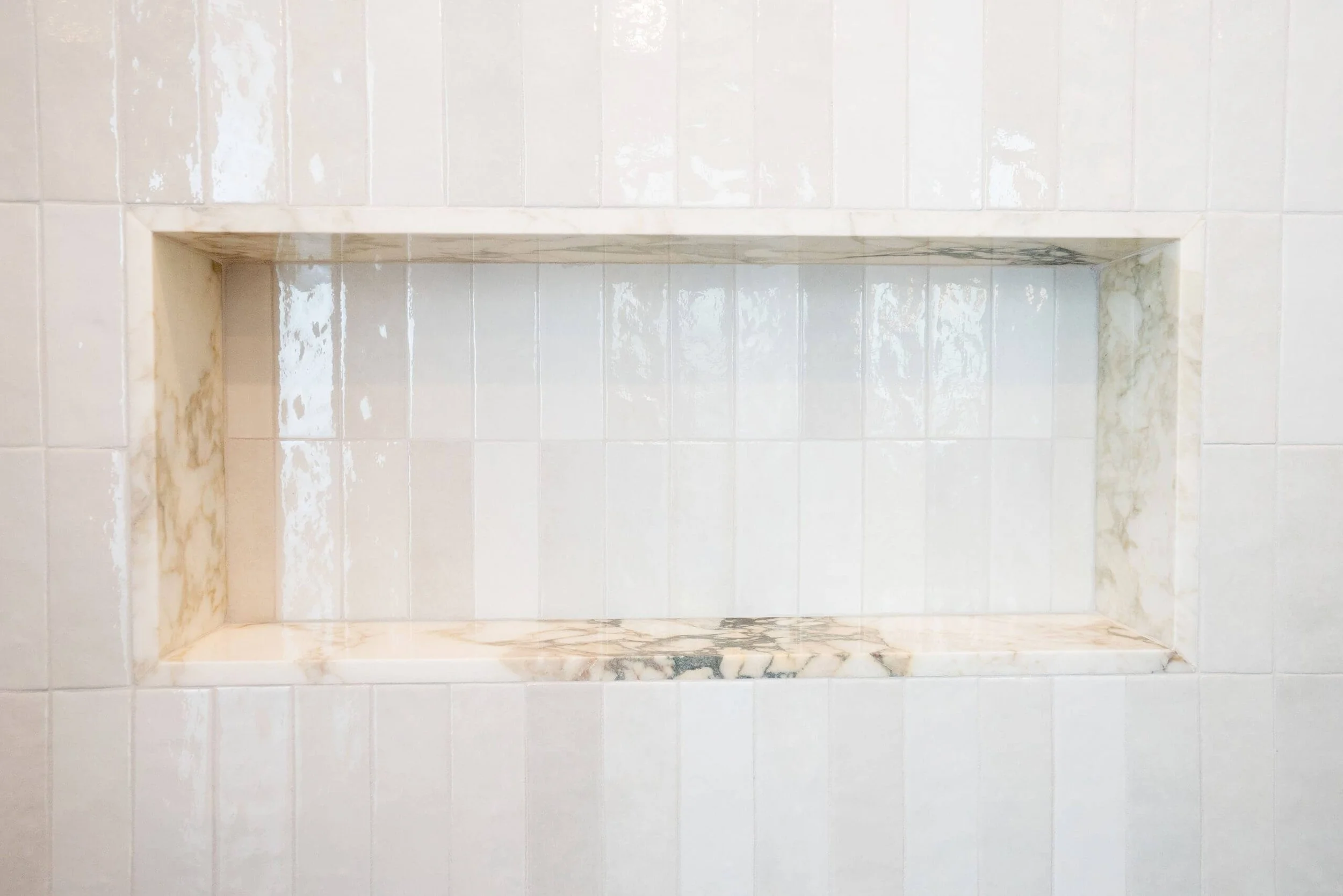 Premium vertical tiling in Toorak bathroom remodel