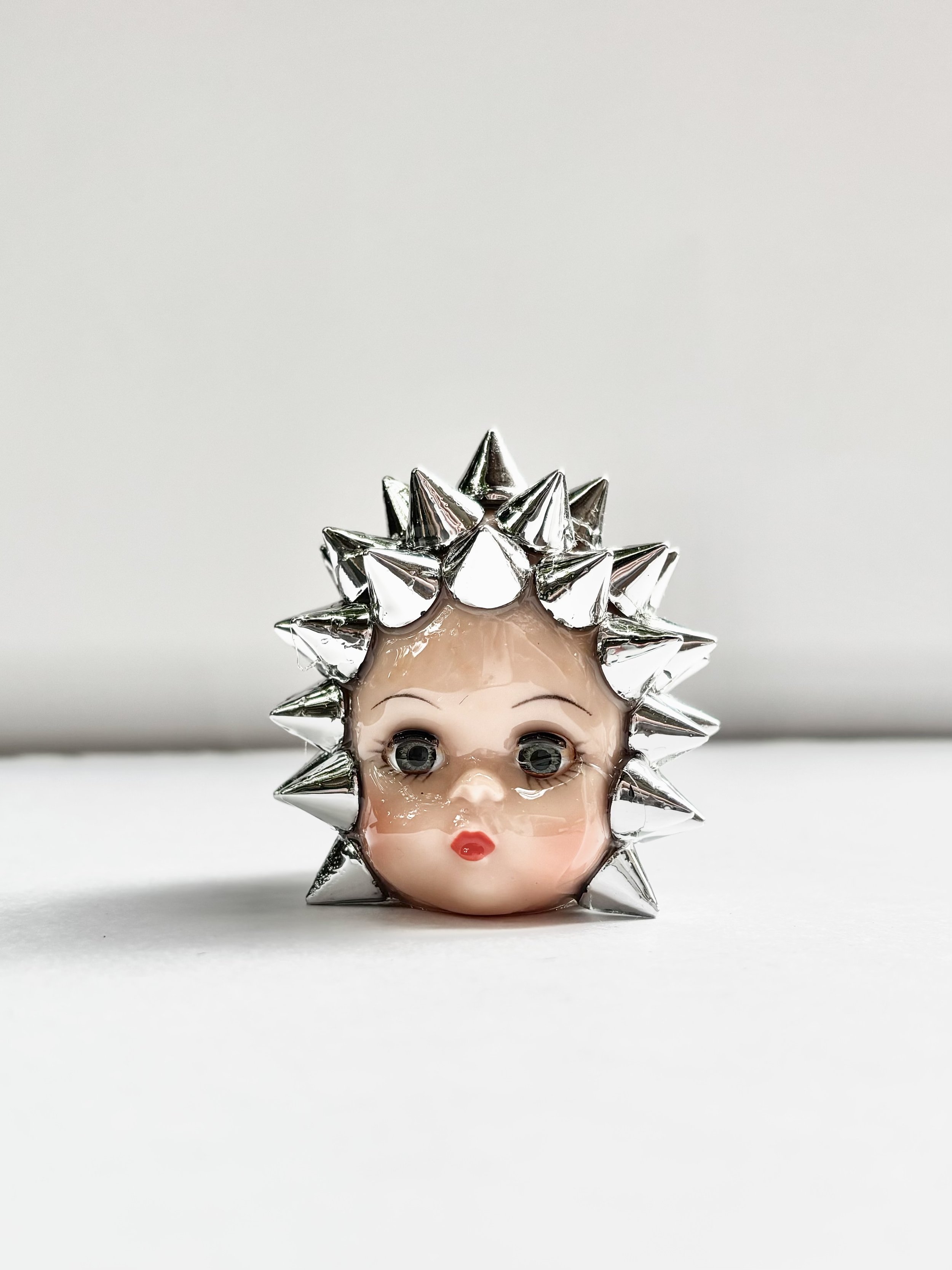 Spiked Doll Head Decor