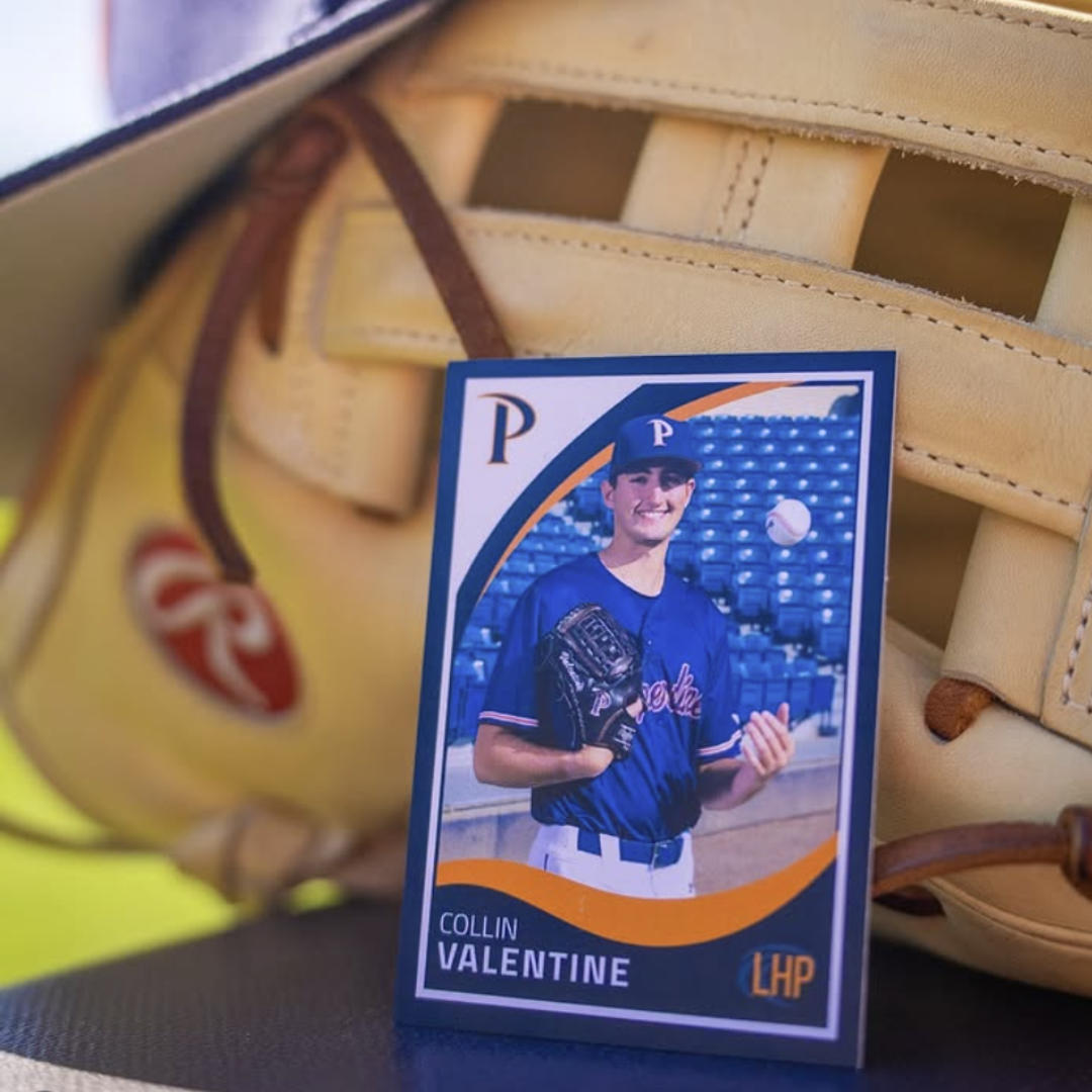 Pepperdine Waves baseball trading card displayed against a baseball glove on the field. Image courtesy of Pepperdine Baseball via Instagram.