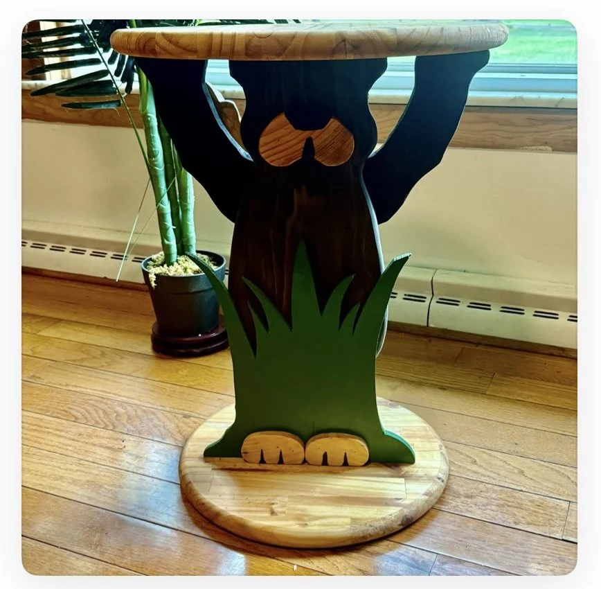 Handmade bear-shaped wood table by Firstborn Mercantile