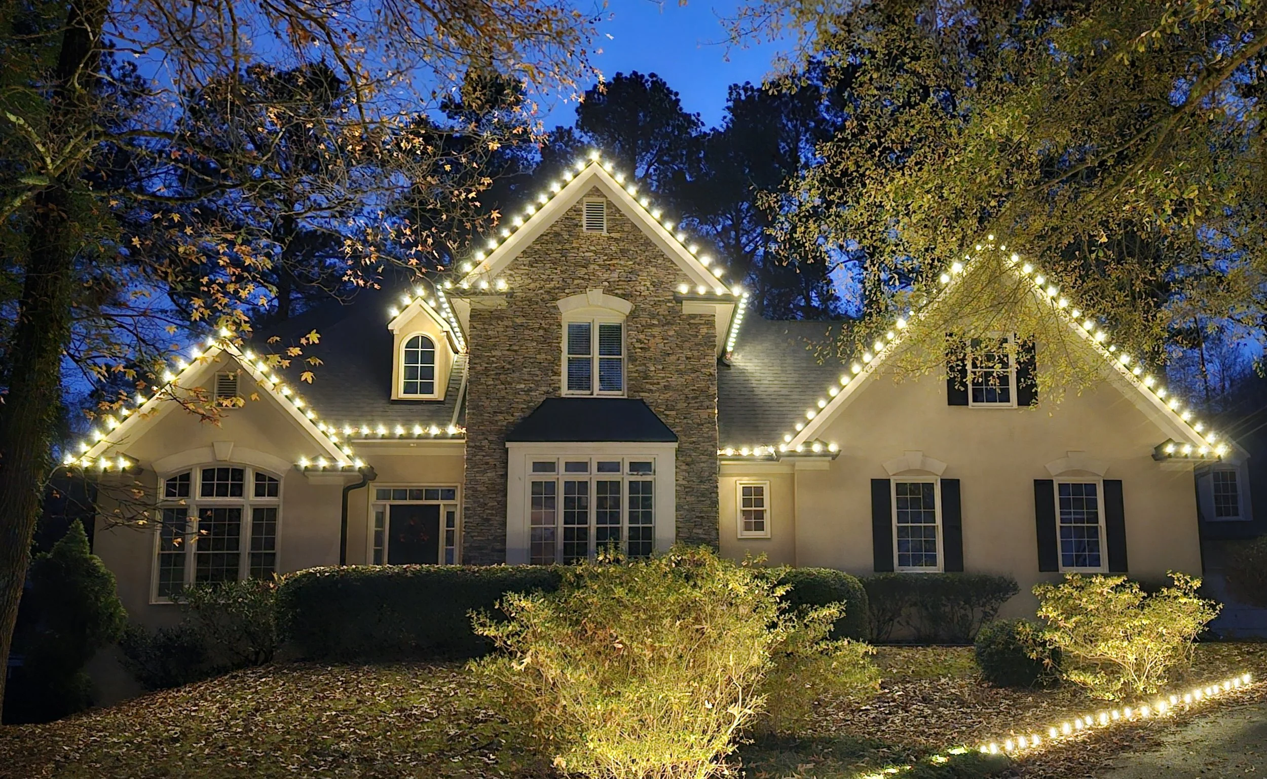 Warm white Christmas lights in Waterford Community in Cartersville by Rich Lighting Co