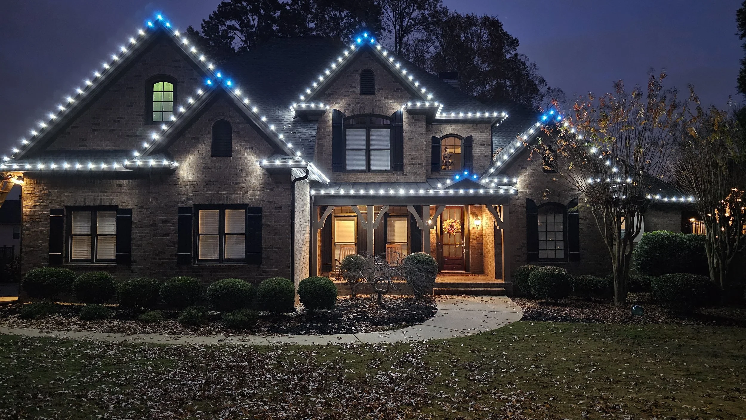 Cool White and teal aqua residential Christmas light installation
