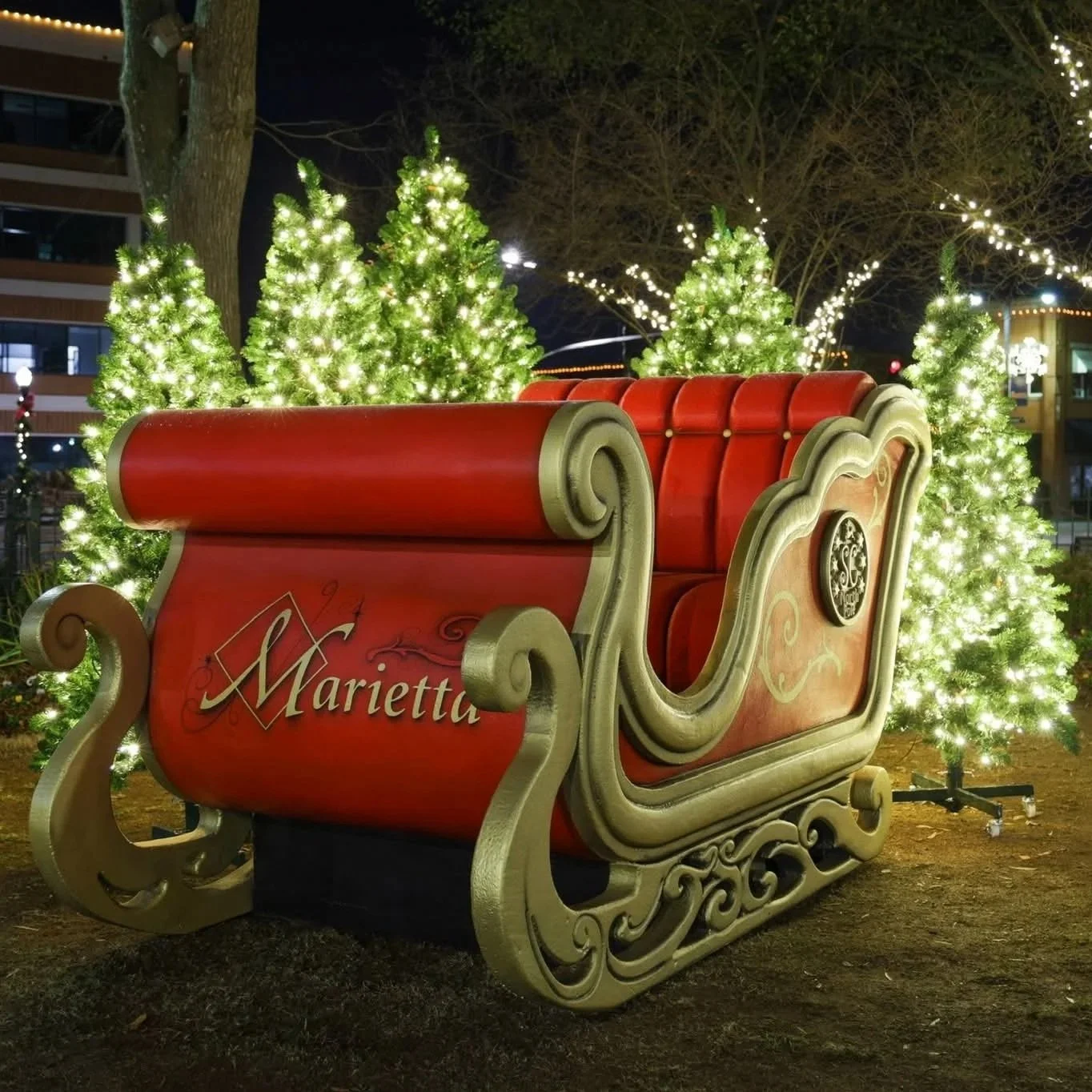 Custom photo op Santas sleigh by Rich Lighting Co for Marietta Square Christmas lights installation