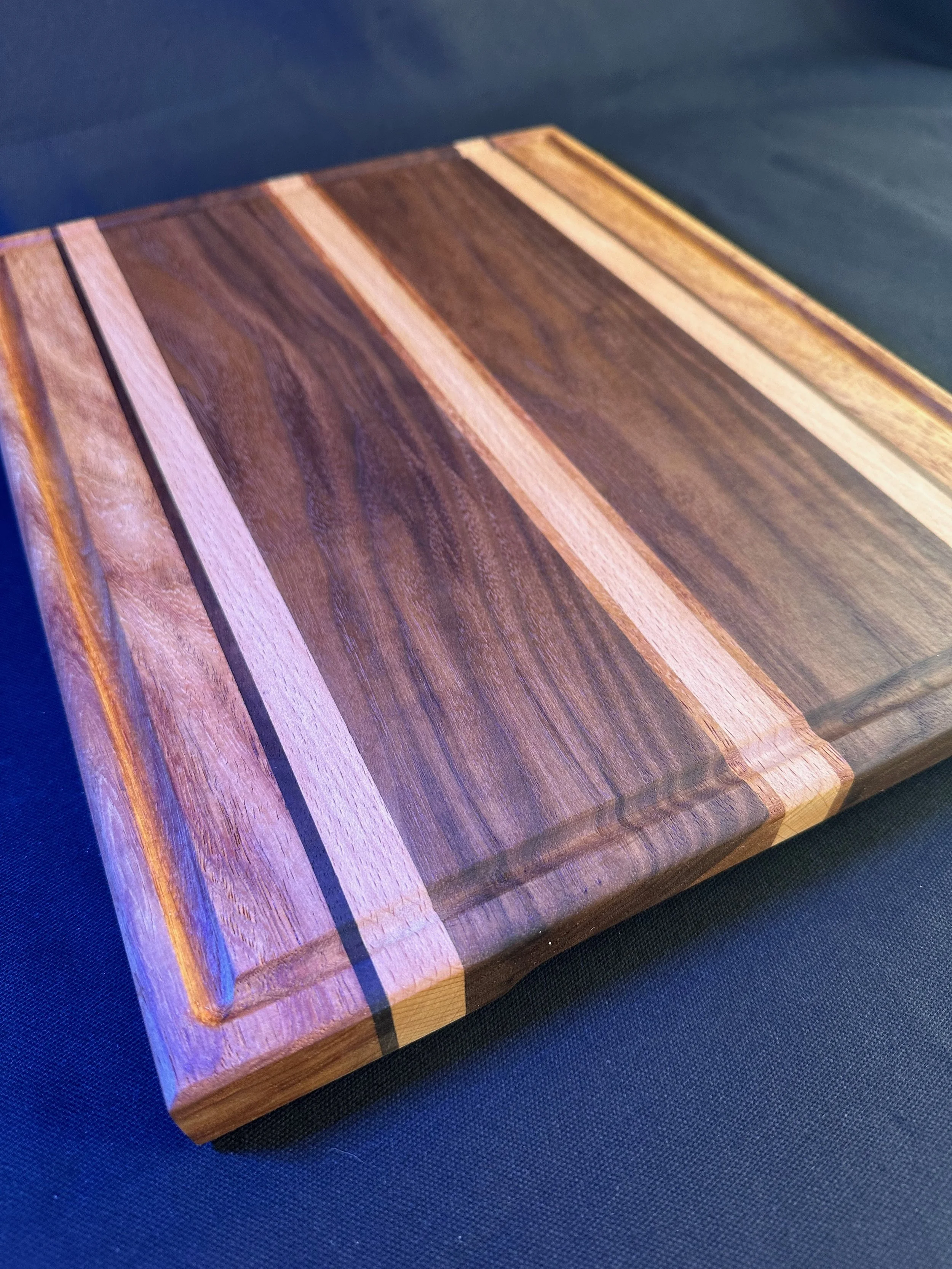 Walnut, Ash and Queensland Walnut chopping board.