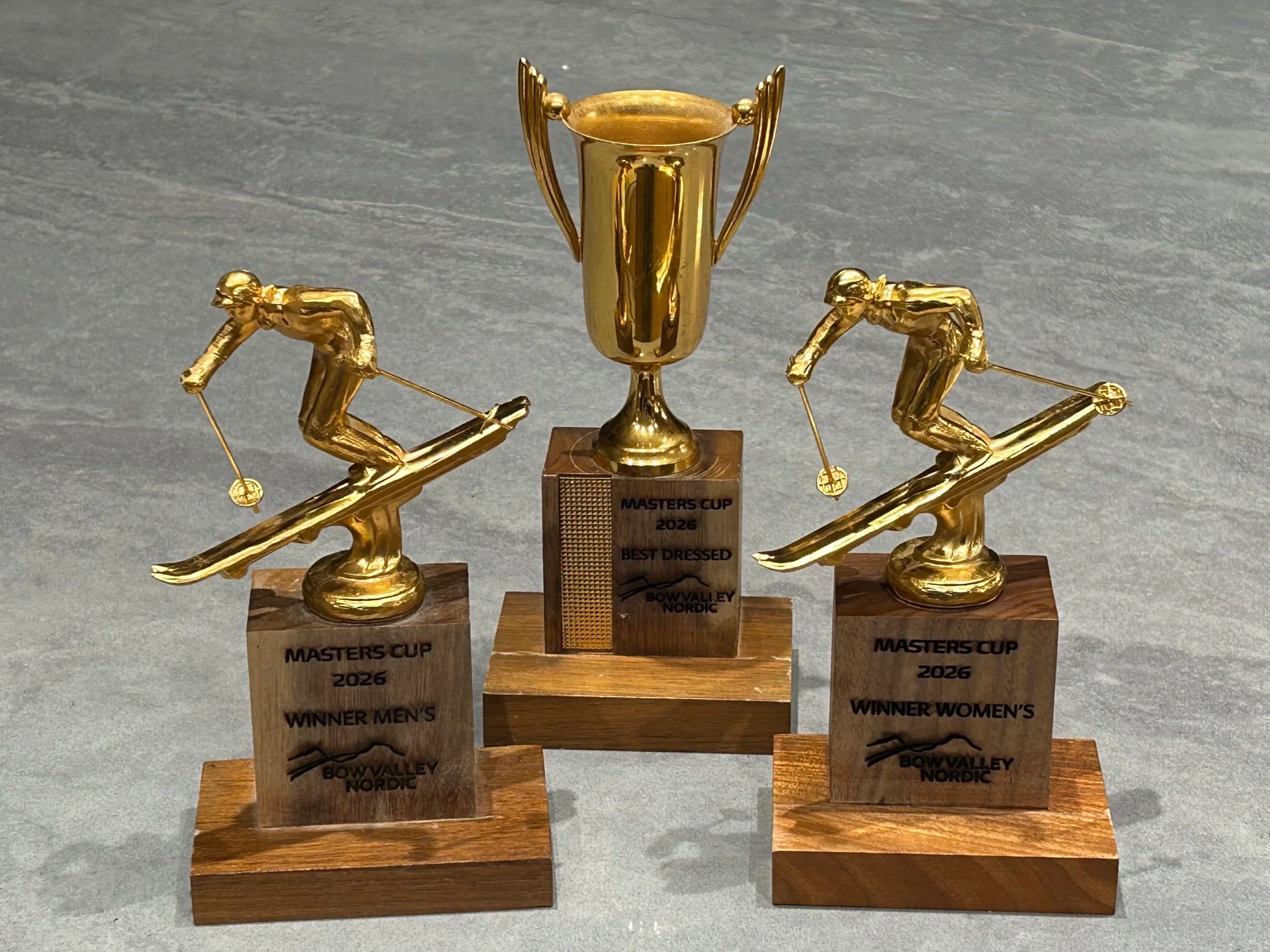 Masters Cup trophies - for women's winter, men's winner, and best dressed skier.
