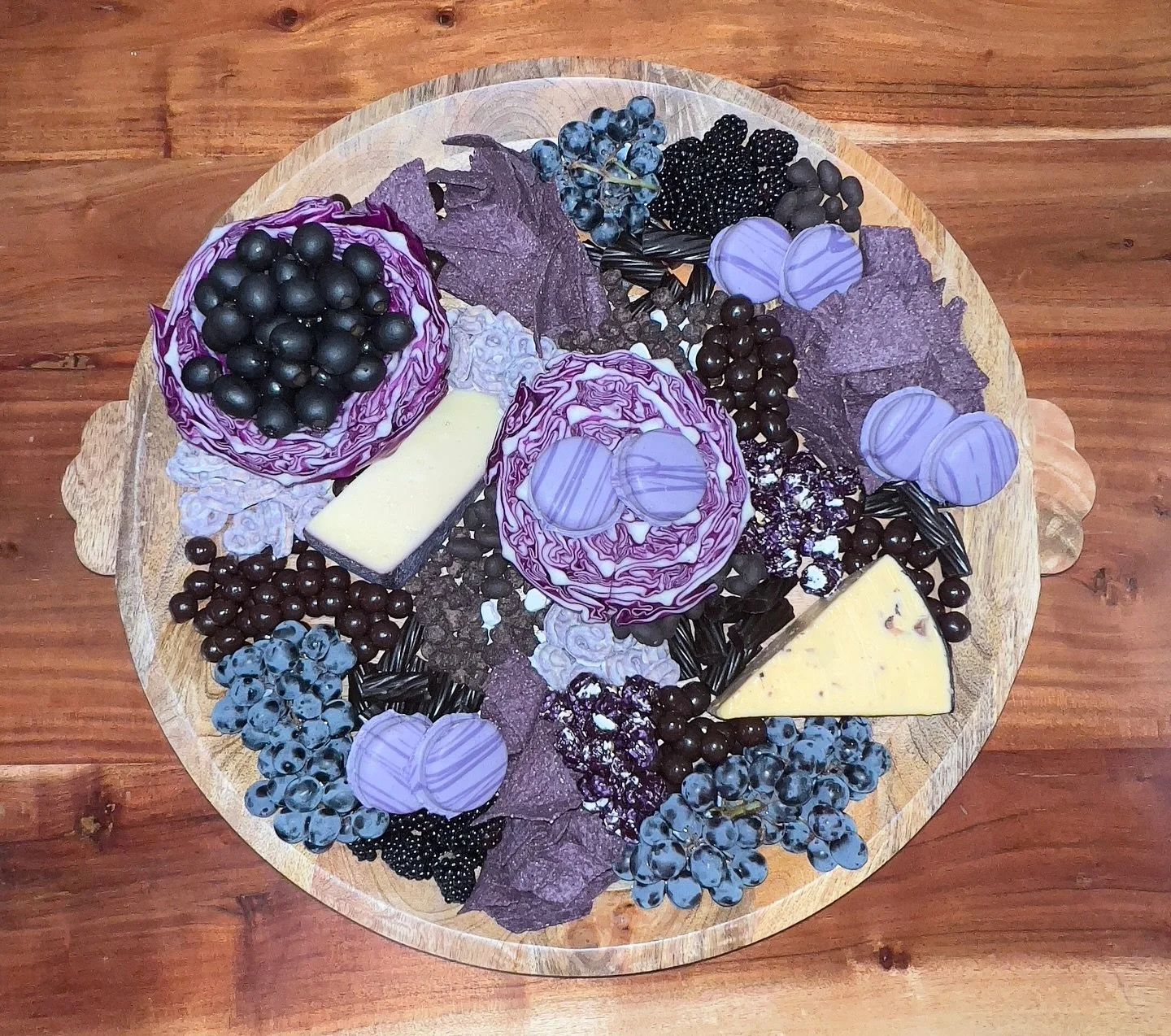 Wednesday @netflix Watch Party complete with @wendys Meals of Misfortune and our custom Dream Big @wednesday themed XL Charcuterie snack board 💜🖤 We specialize in themed in Charcuterie! Get your holiday orders in ASAP 🎃🦃🎄 #HappyWednesday #Wednes